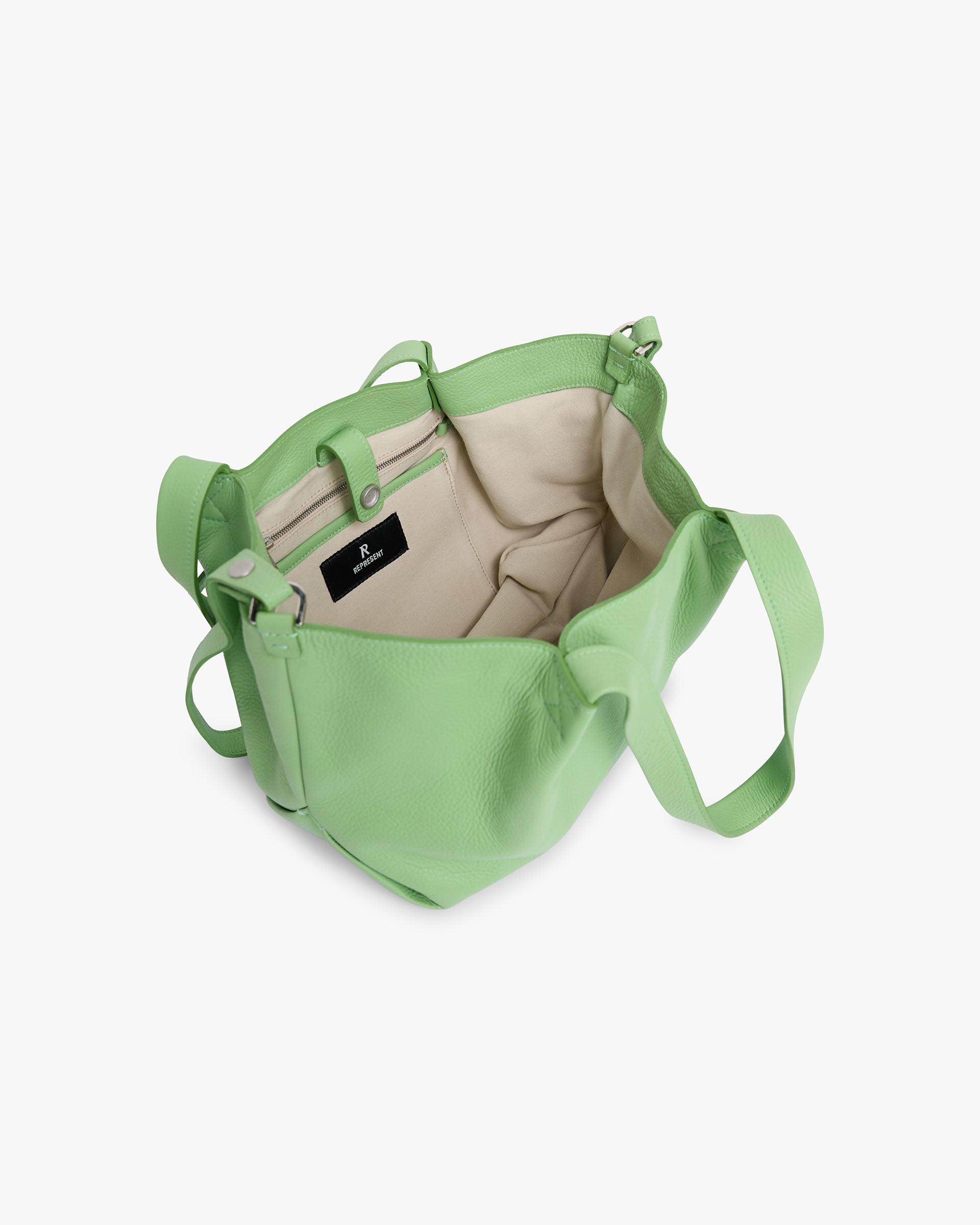Back product image of a womens green mini tote bag on a plain white background | Leather Pleat Mini Tote in Forest Shade | Mini Tote bag with internal pockets and detachable shoulder strap | Womens SS25 Accessories | Represent Clo