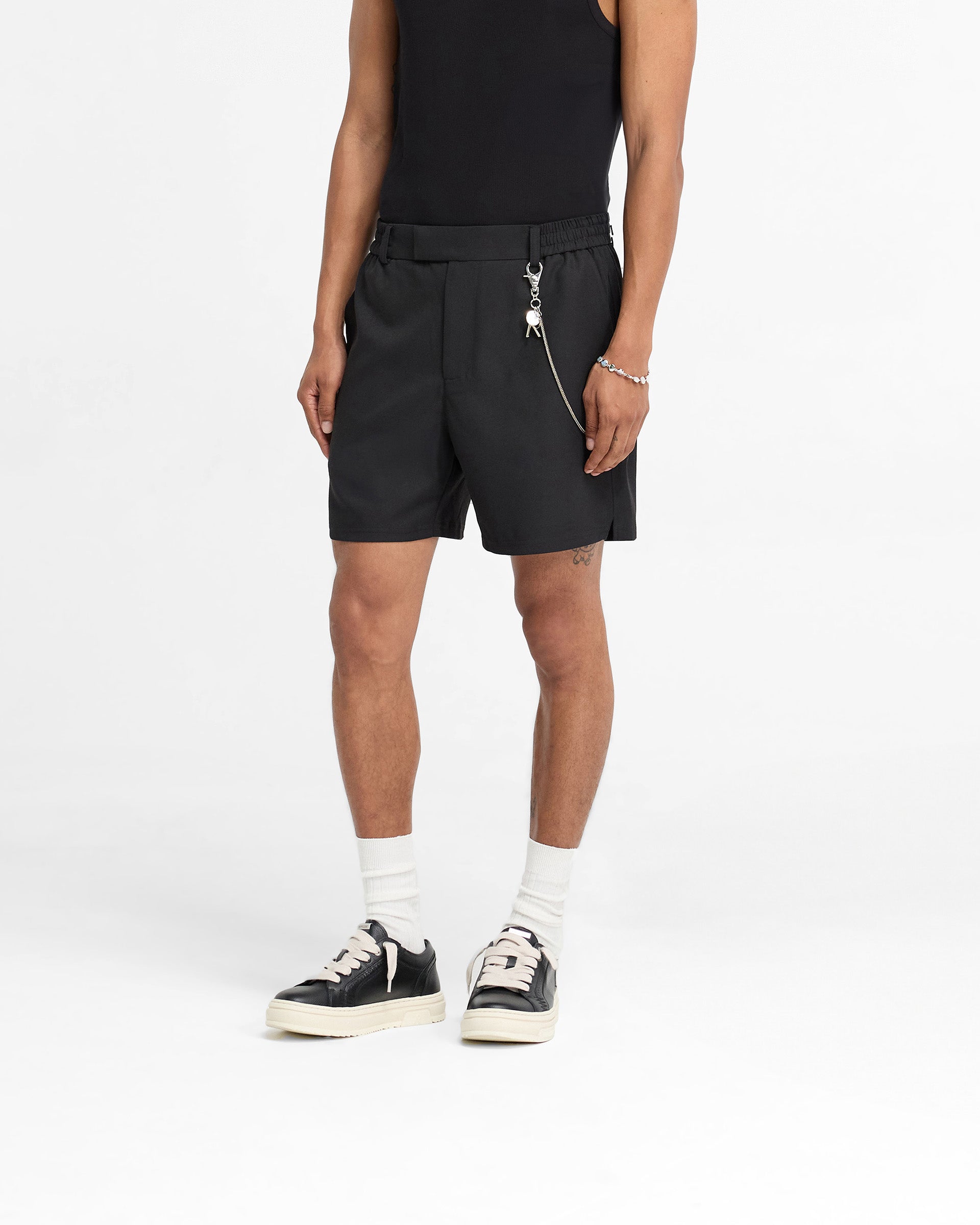 Back product image of mens black shorts on a plain white background | Logo Yacht Short in Black | Shorts with back pocket contrast embroidered logo | FW24 Shorts | Represent Clo