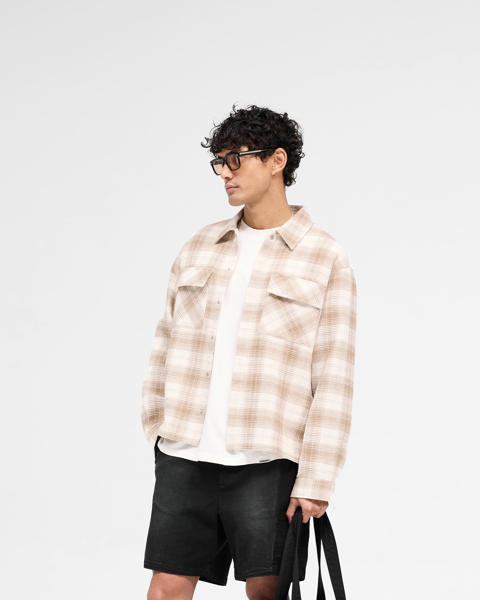 Back product image of a mens brown shirt on a plain white background | Waffle Flannel Shirt in Mid Brown | Flannel shirt with double chest pockets and concealed popper fastenings | SS25 Shirts | Represent Clo