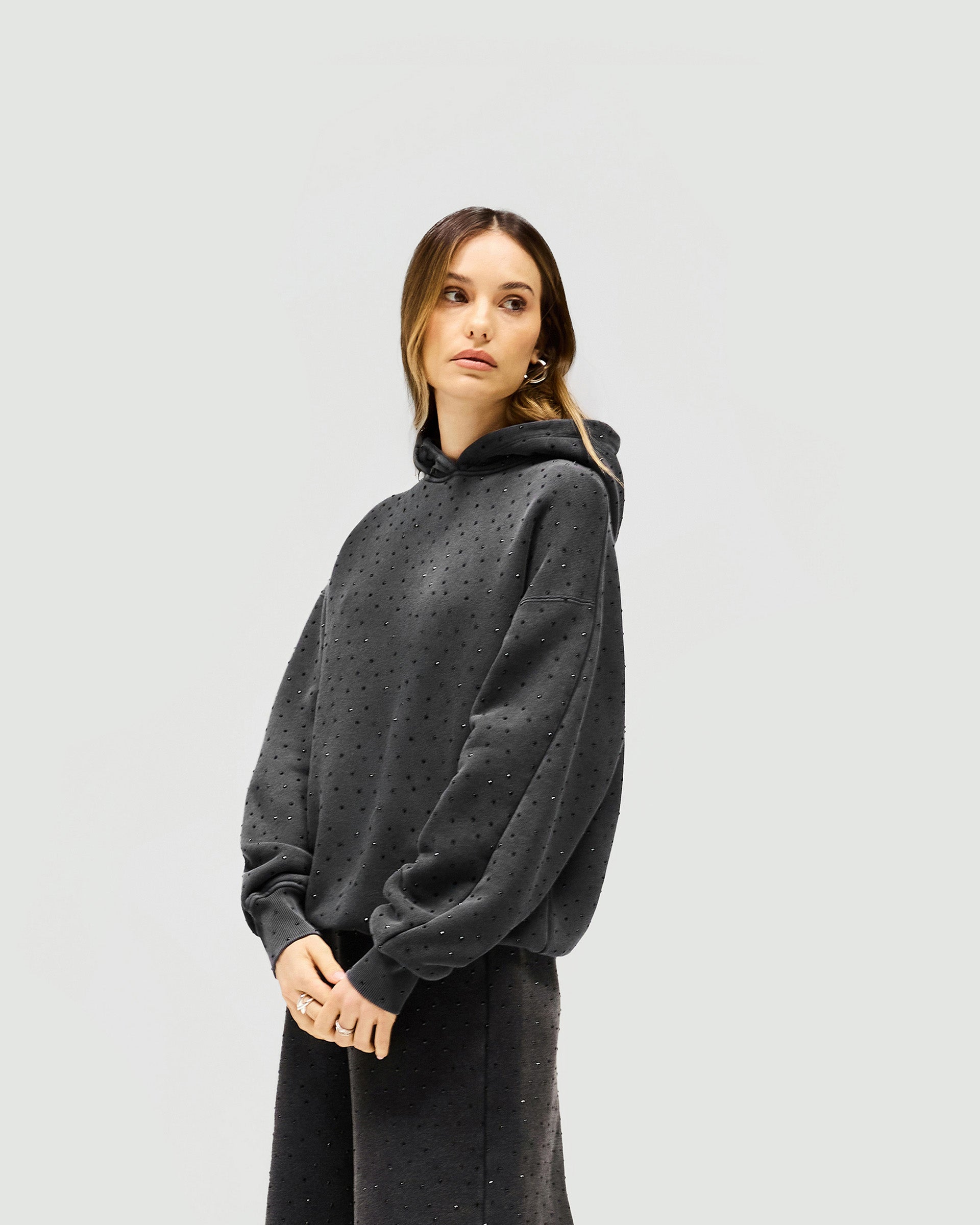 Back product image of a womens grey hoodie on a plain white background | Spark Hoodie in Washed Grey | Oversized slouchy hoodie with all over hotfix | Womens SS25 Hoodies | Represent Clo