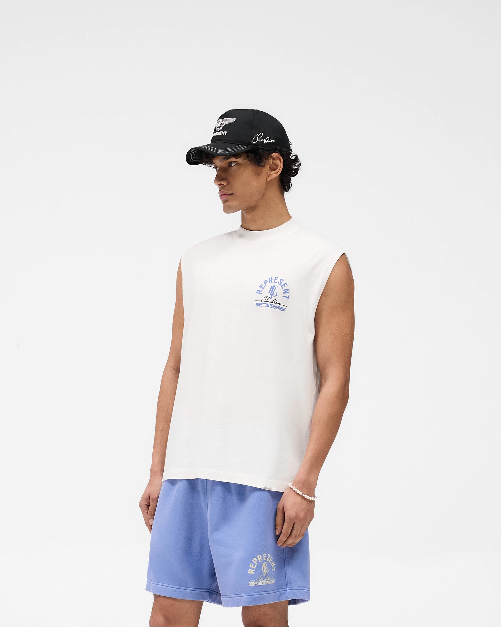 Back product image of a mens white tank on a plain white background | Competition Department Tank in Flat White | Oversized fit tank with chest graphic and raw-edge hem | SS25 T-Shirts | Represent Clo