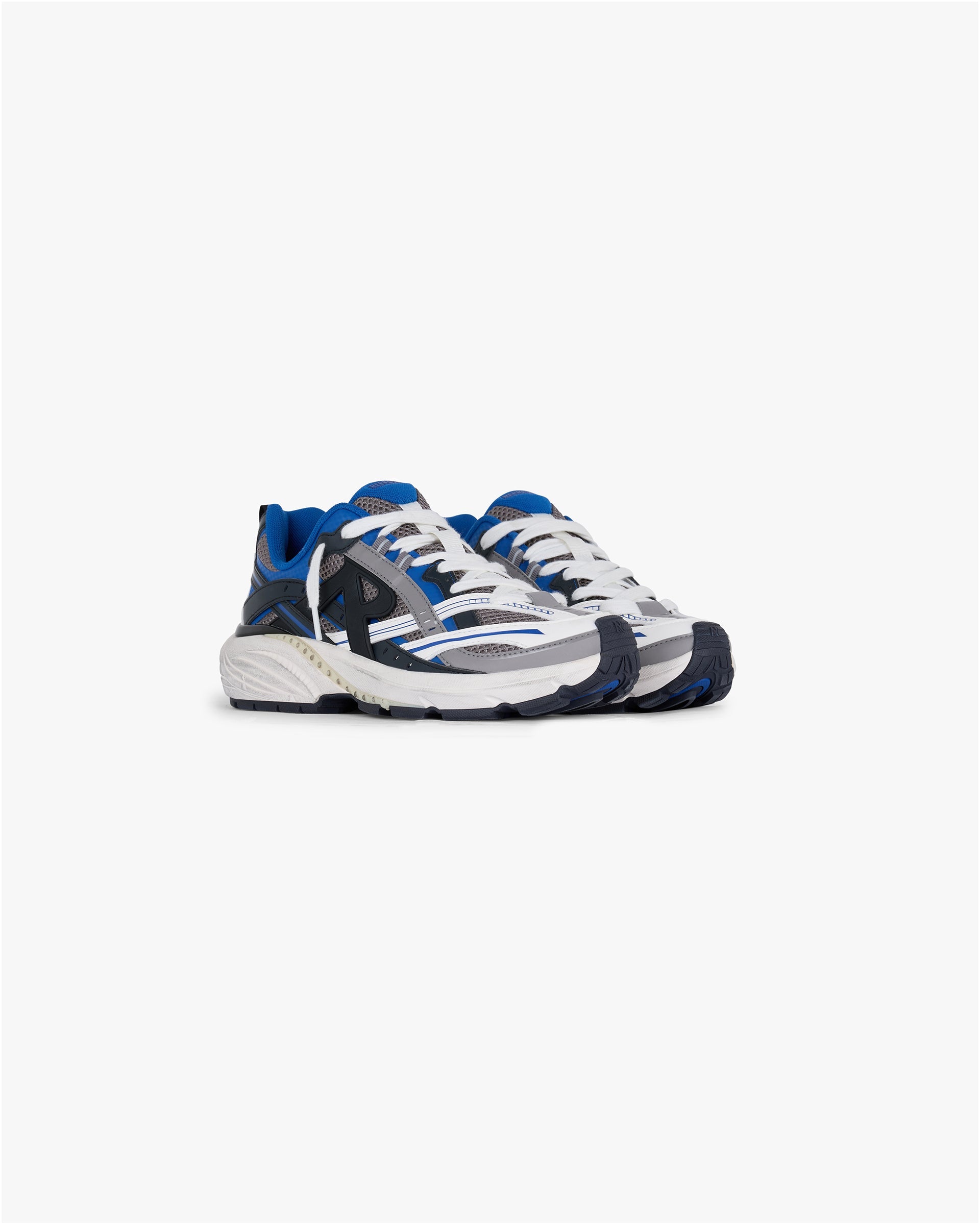 Back product image of a mens grey and blue runner shoe on a plain white background | Storm Runner in Royal Blue Grey | Leather overlays with mesh base for lightweight breathability | SS25 Footwear | Represent Clo