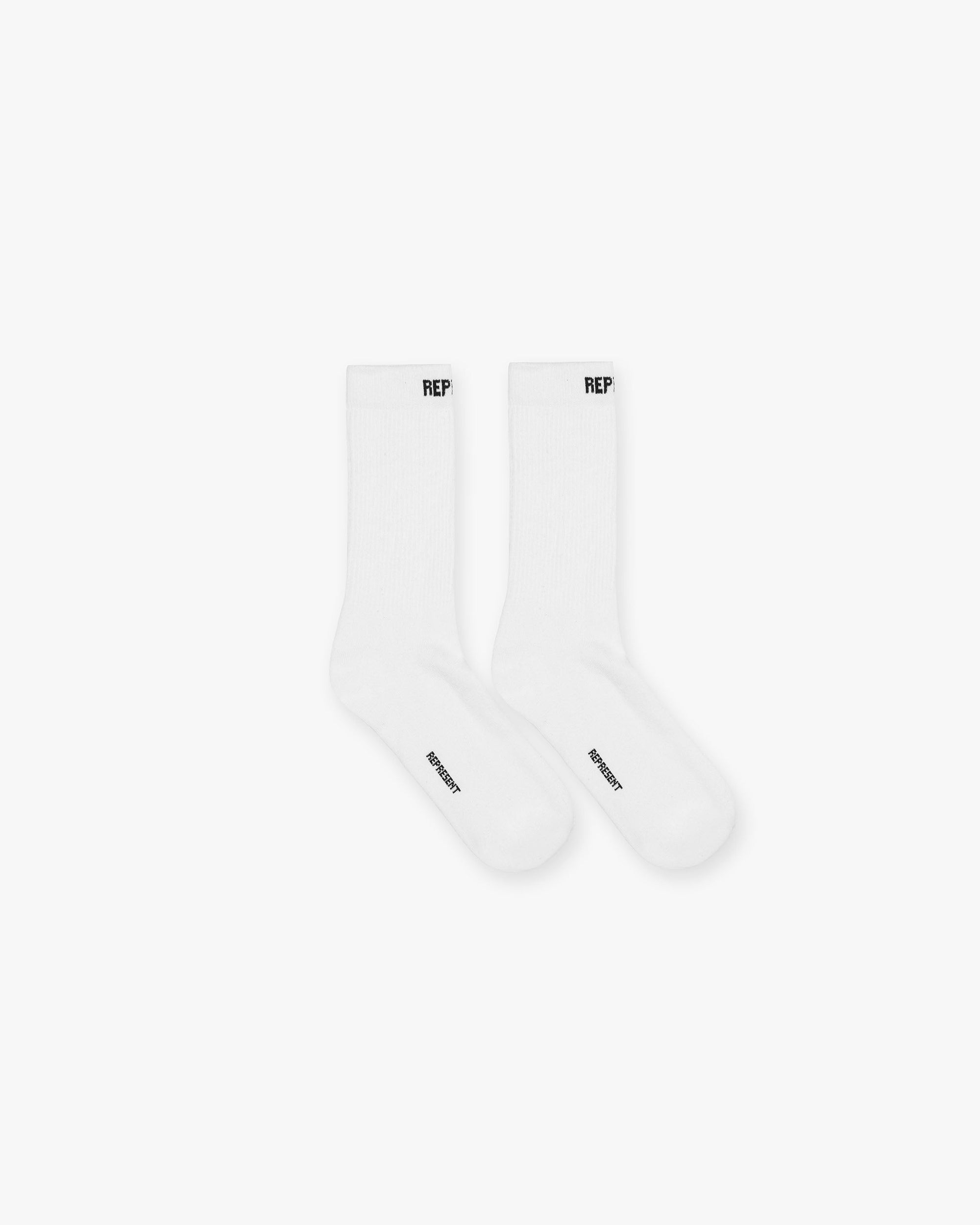 Front product image of mens white socks on a plain white background | Core Sock in White | Soft cotton blend socks with ribbed detail | FW23 Accessories | Represent Clo