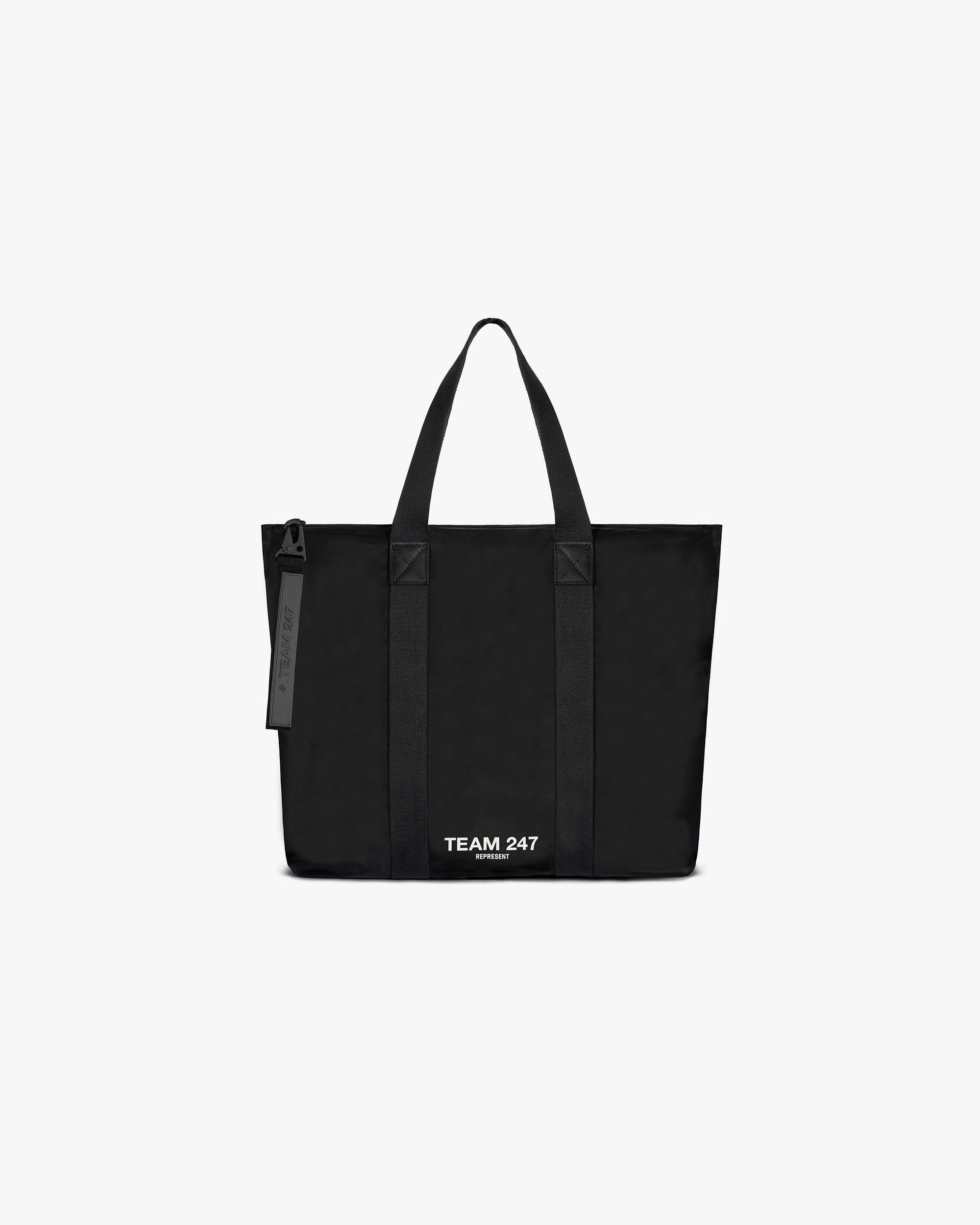 Front product image of a mens black tote bag on a plain white background | Team 247 Tote Bag in Black | Spacious nylon tote bag with double handles | 247 Accessories | Represent Clo