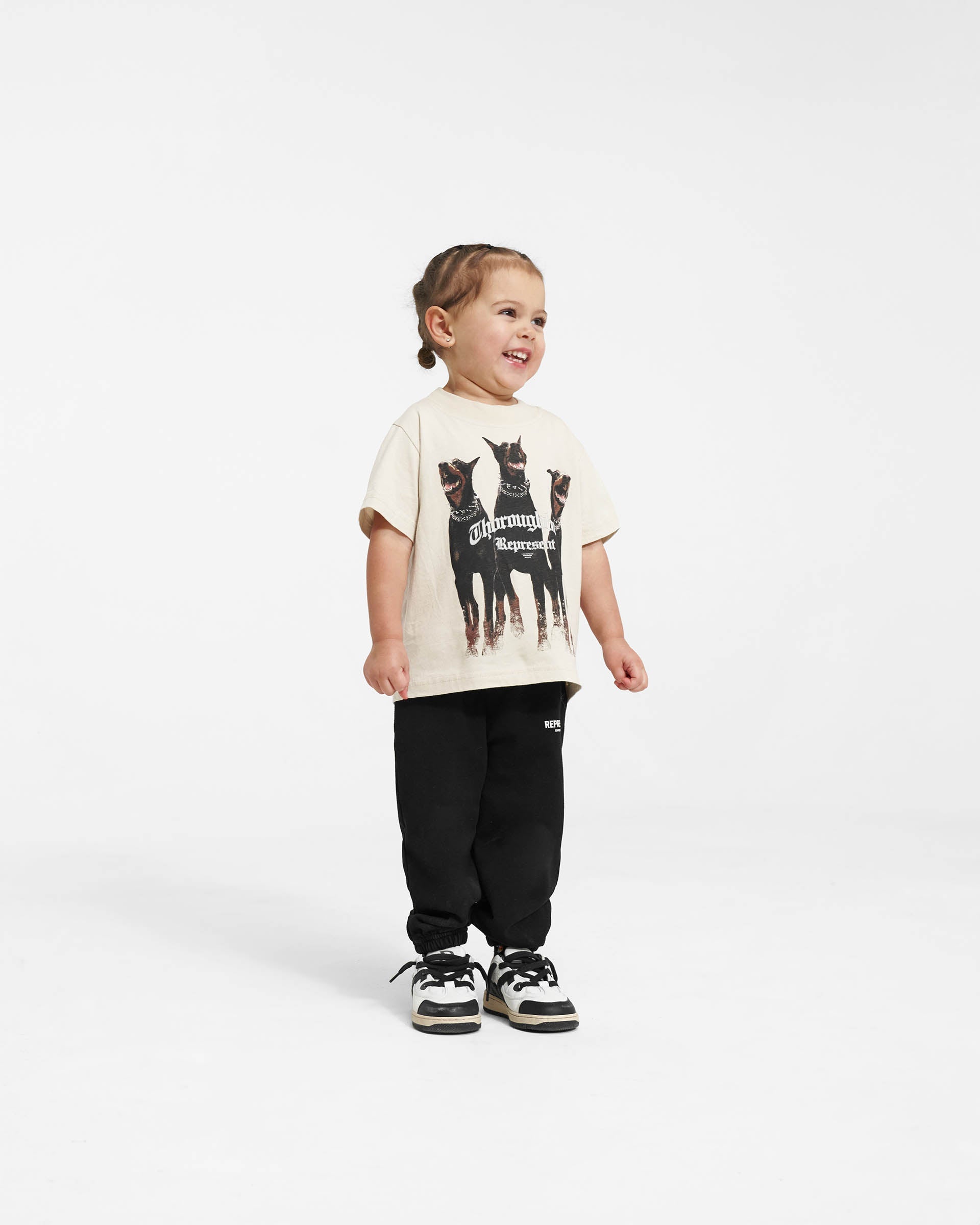 Back product image of a kids white t-shirt on a plain white background | Mini Thoroughbred T-Shirt in Vintage White | Slightly oversized childrens t-shirt | Mini T-Shirts | Represent Clo