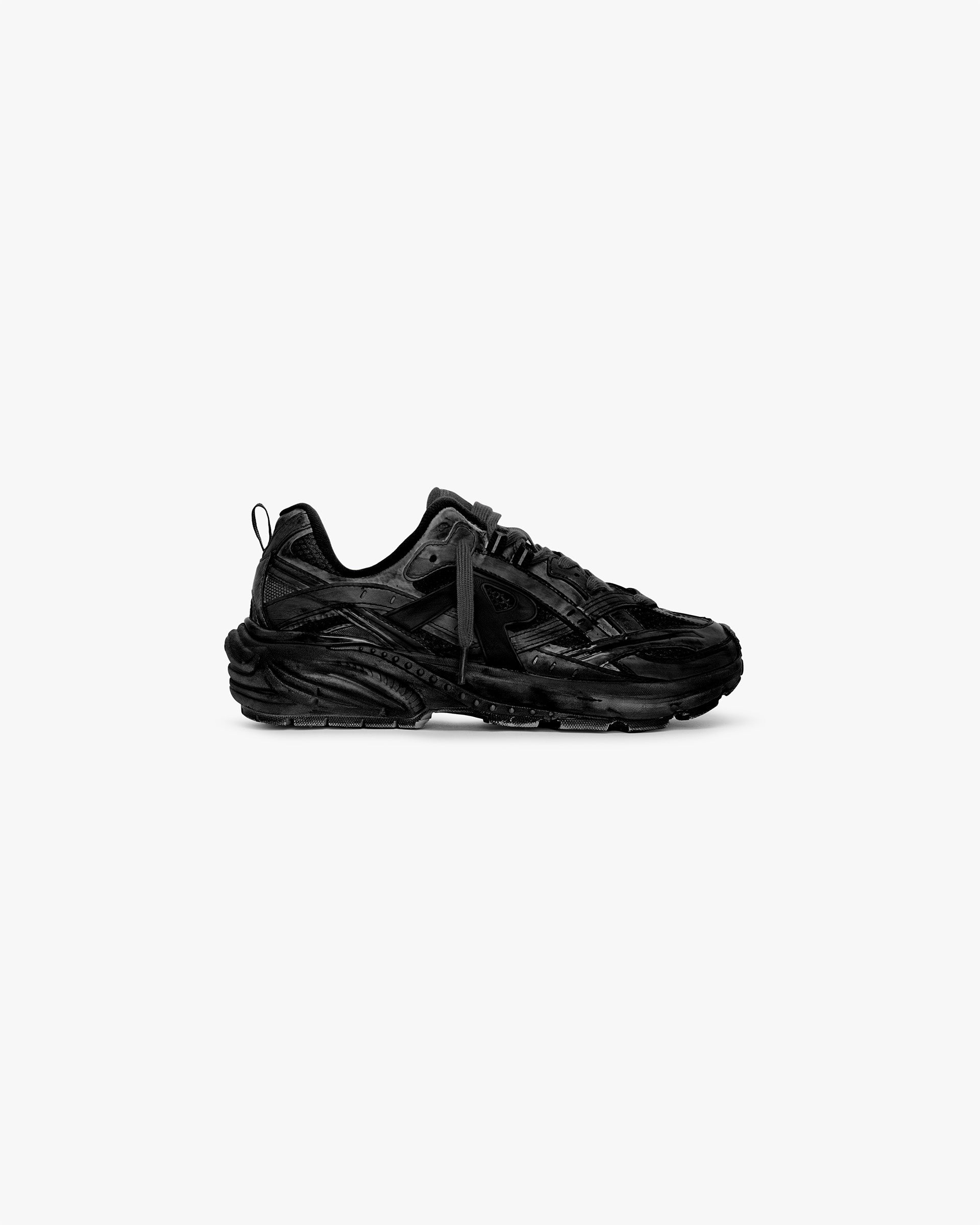 Front product image of mens black footwear on a plain white background | Storm Runner in Dip Dye Off Black | Jersey footwear with dip dye effect | SS25 Footwear | Represent Clo