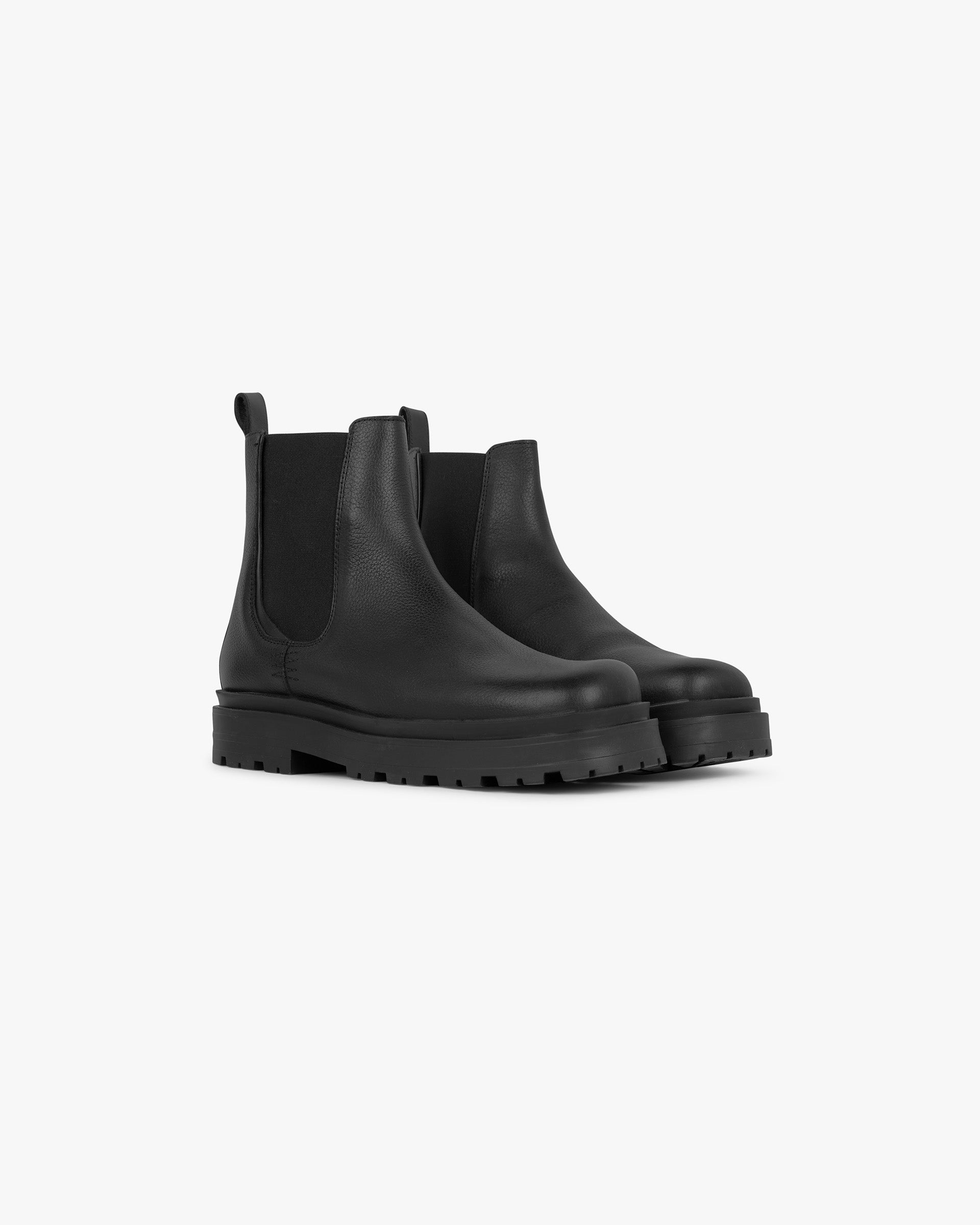 Back product image of a mens black leather boot on a plain white background | Work Boot Tumbled Leather in Black | Leather boot with elastic gusset and pull tab | PRE SS25 Footwear | Represent Clo