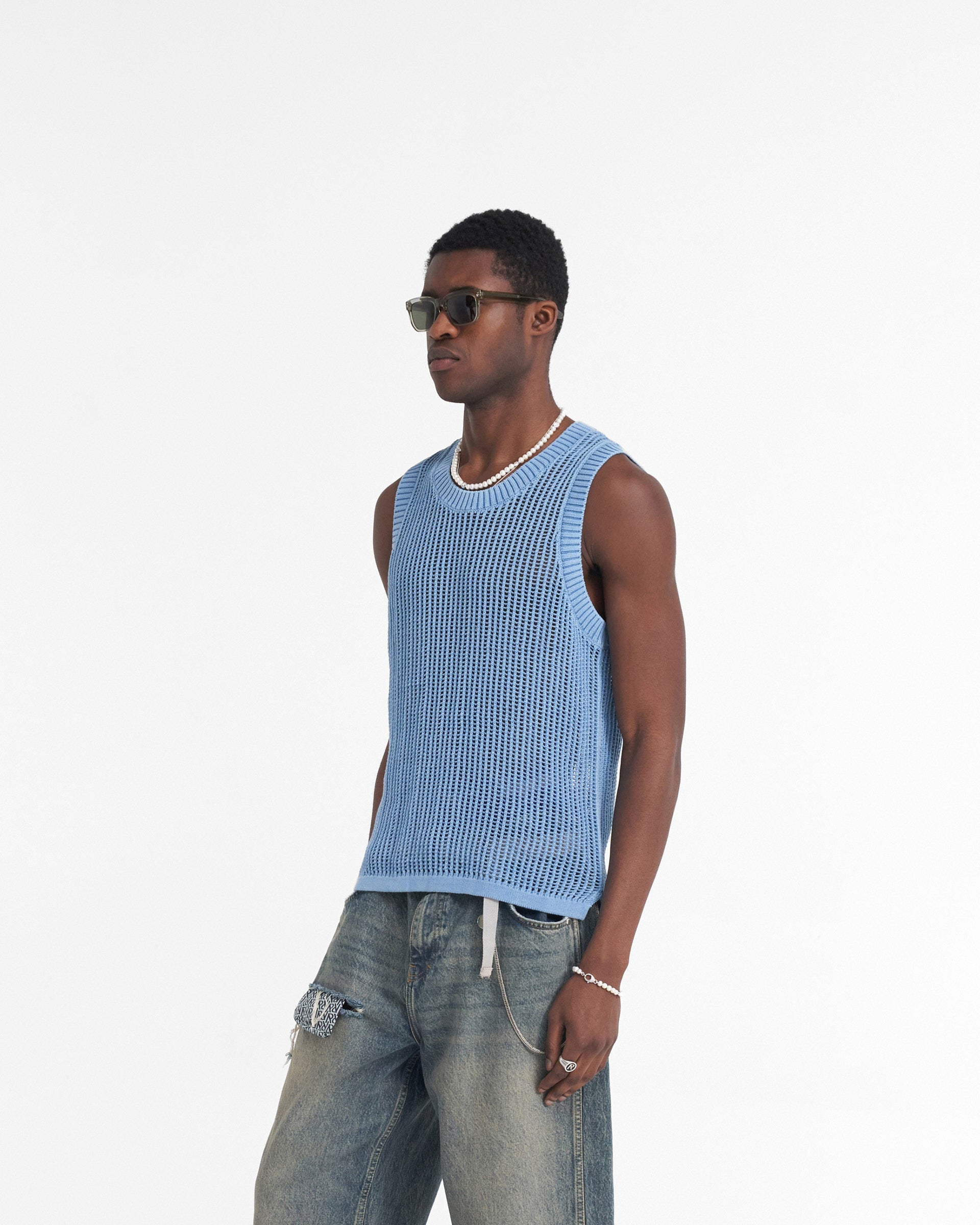 Back product image of a mens blue knitted vest on a plain white background | Washed Knit Vest in Sky Blue | Regular fit garment dyed knitwear | SS24 Knitwear | Represent Clo