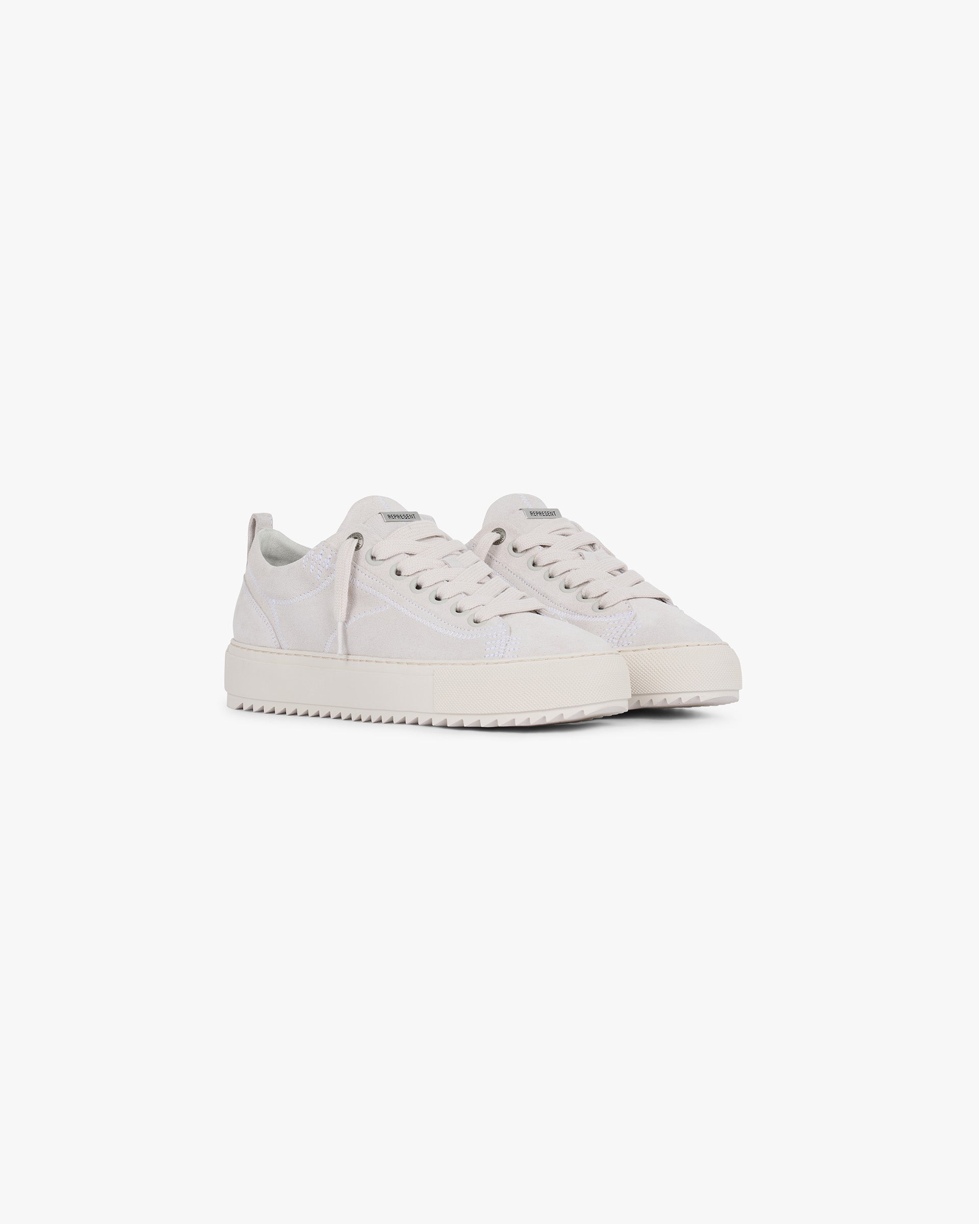 Back product image of mens white suede footwear on a plain white background | Alpha 2.0 in Vintage White | Suede upper with branded metal eyelets | PRE SS25 Footwear | Represent Clo