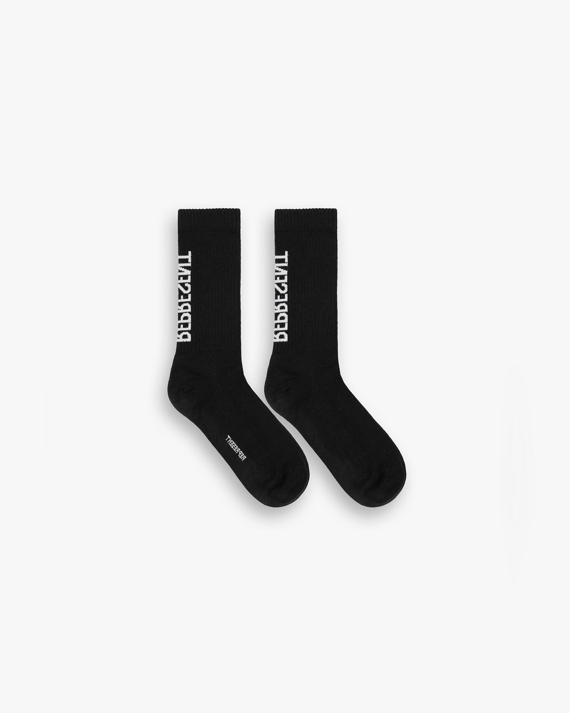 Front product image of mens black socks on a plain white background | Represent Logo Socks in Jet Black | Cotton hemp jersey socks | SS25 Accessories | Represent Clo