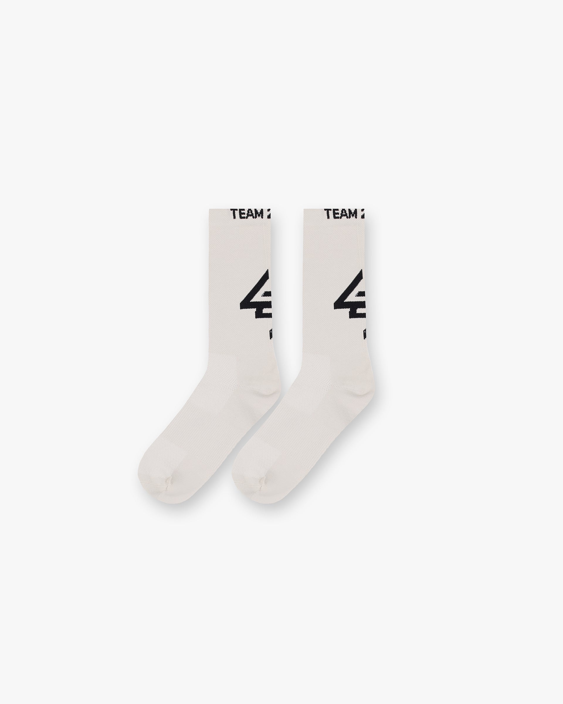 Back product image of mens cream socks on a plain white background | 247 X Puma Race Socks in Cream | Lightweight finish with logo branding | 247 Accessories | Represent Clo