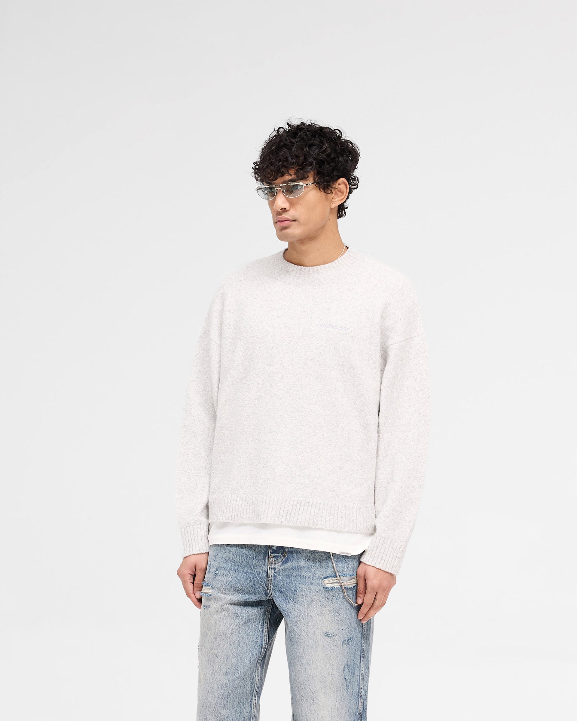 Back product image of a mens grey knit jumper on a plain white background | Marled Knit Jumper in Ice Grey Marl | Knitwear with ribbed collar, cuffs, and hem | SS25 Knitwear | Represent Clo
