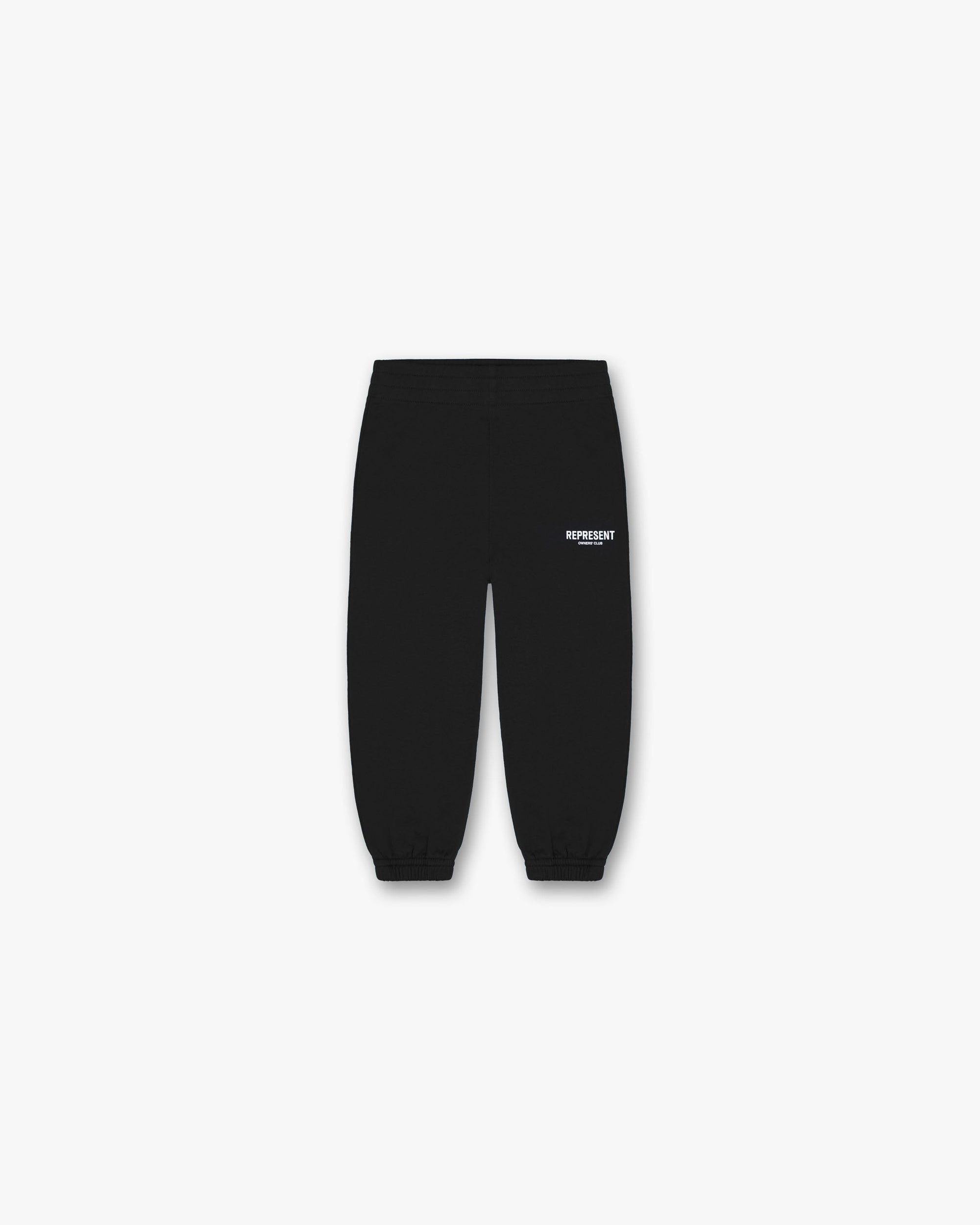 Front product image of childrens black sweatpants on a plain white background | Represent Mini Owners Club Sweatpants in Black | Sweatpants with ribbed cuffs | Owners Club Pants | Represent Clo