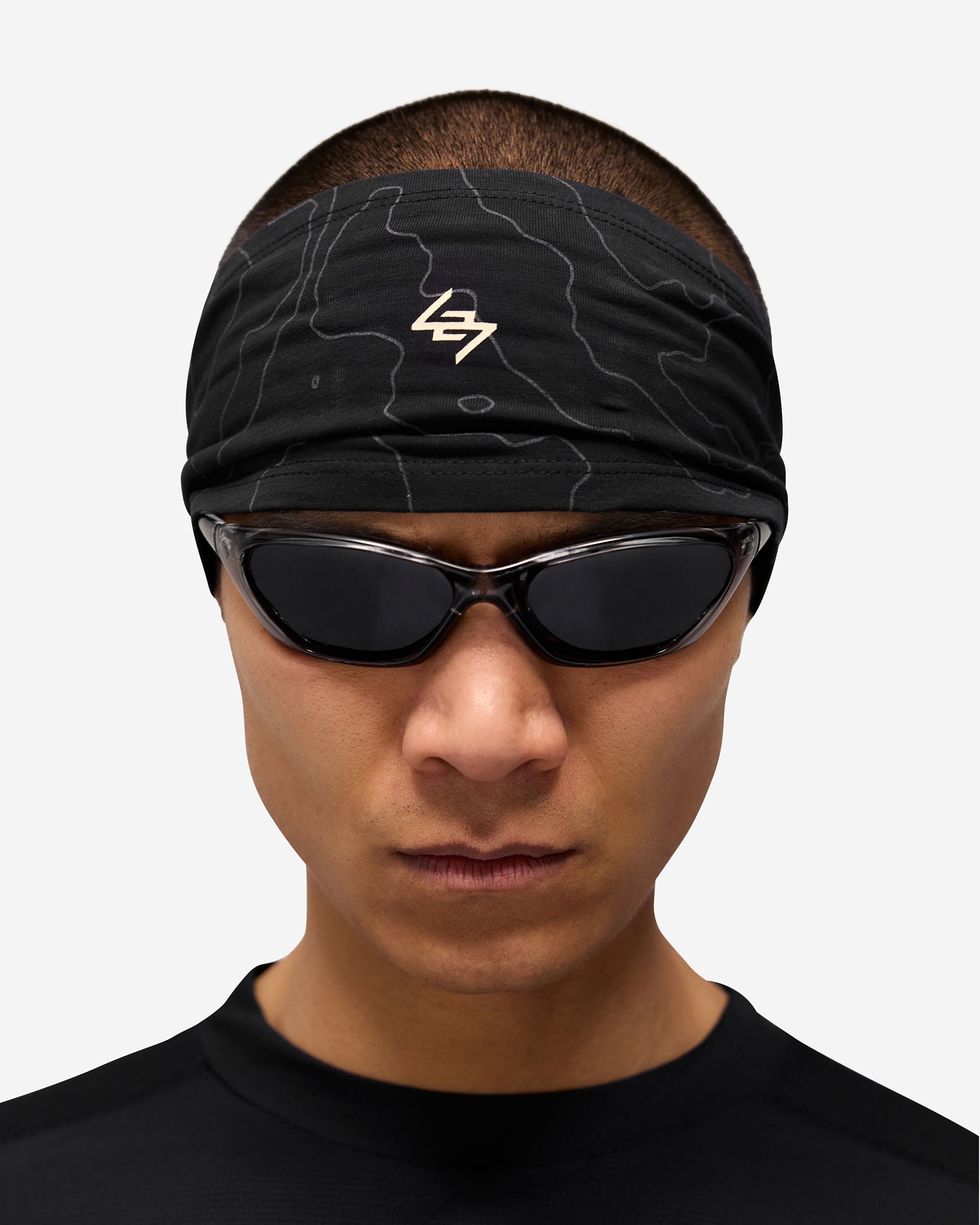 Back product image of a mens black headband on a plain white background | 247 Contour Headband in Black | Running headband with reflective contour design | 247 Accessories | Represent Clo