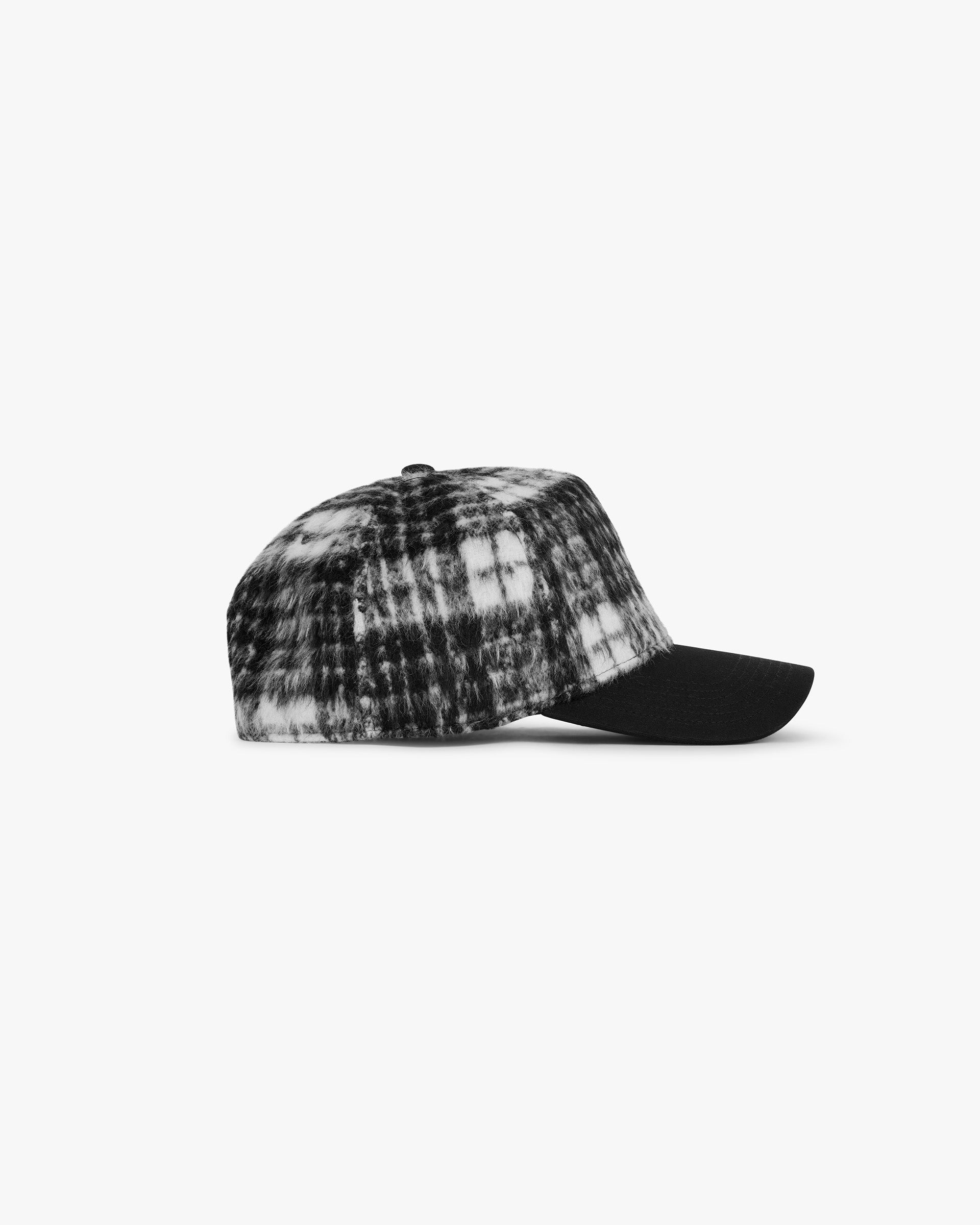 Back product image of a mens black and white trucker cap on a plain white background | Check Initial Trucker Cap in Jet Black White | Hairy check cap with snapback adjuster and metal pin | PRE SS25 Accessories | Represent Clo