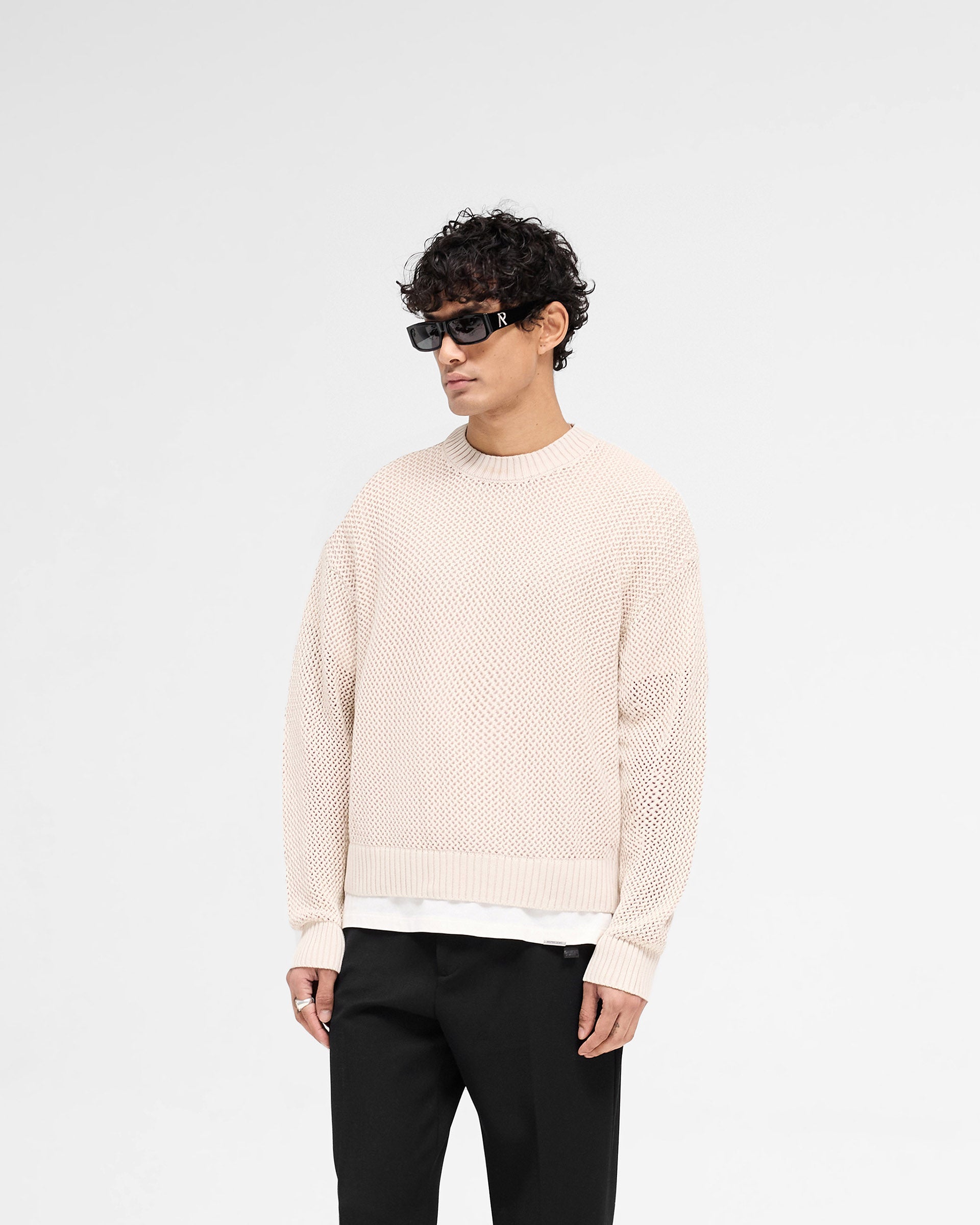 Back product image of a mens white knit sweater on a plain white background | Open Gauge Knit Sweater in Off White | Knit sweater with ribbed collar, cuffs and hem | SS25 Knitwear | Represent Clo