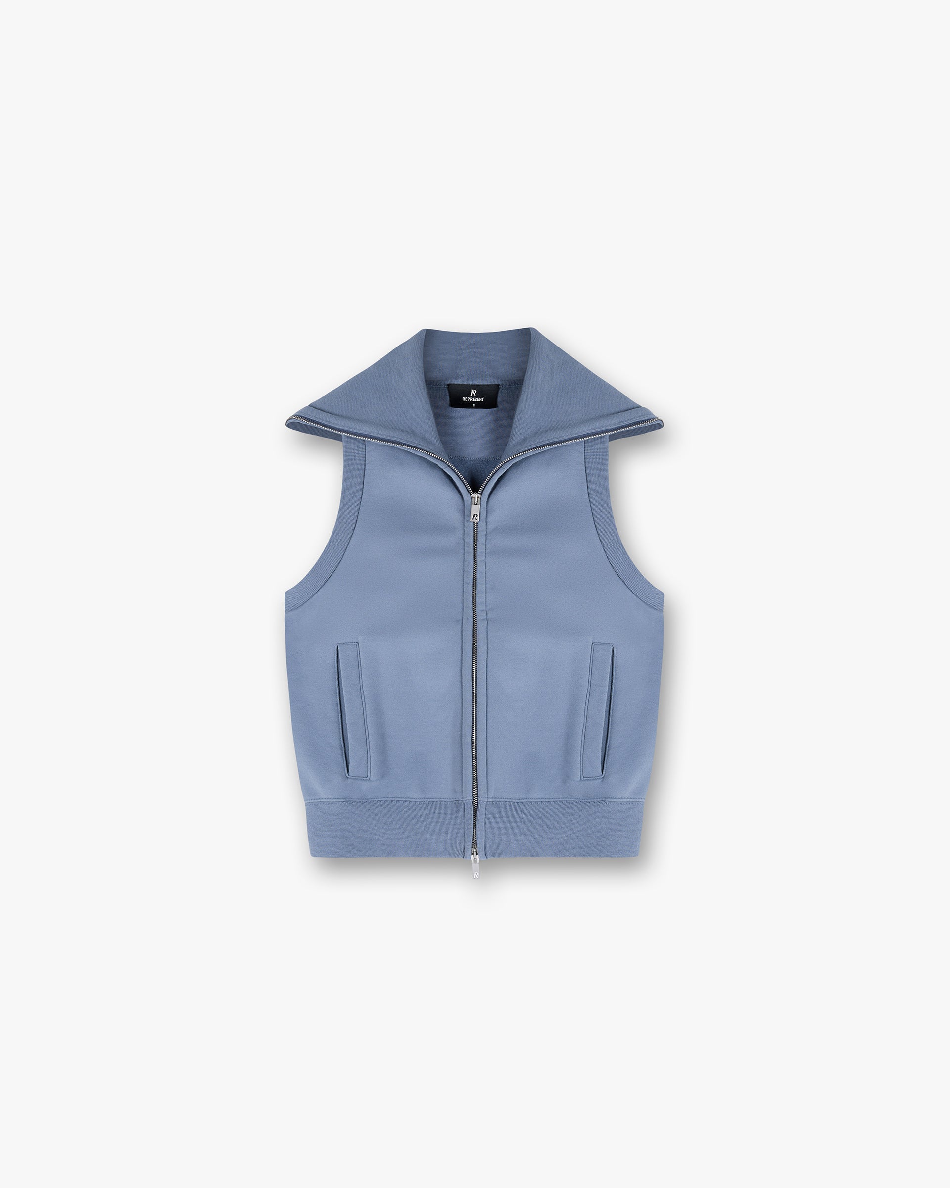 Front product image of a womens blue gilet on a plain white background | Owners Club Gilet in Steel Blue | V Neck tank top with built-in bra | Womens Owners Club Outerwear | Represent Clo