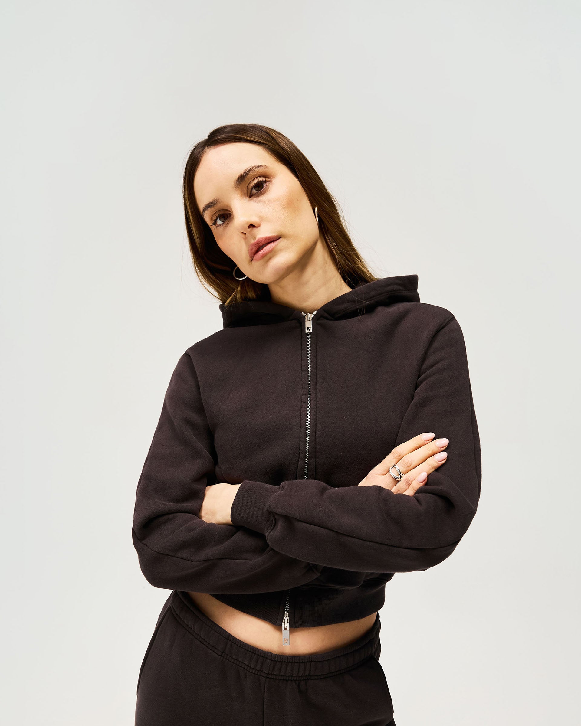 Back product image of a womens black hoodie on a plain white background | Owners Club Slim Zip Hoodie in Black Coffee | Cropped slim fit zip through hoodie with ribbed hem and cuffs | Womens Owners Club Hoodies | Represent Clo