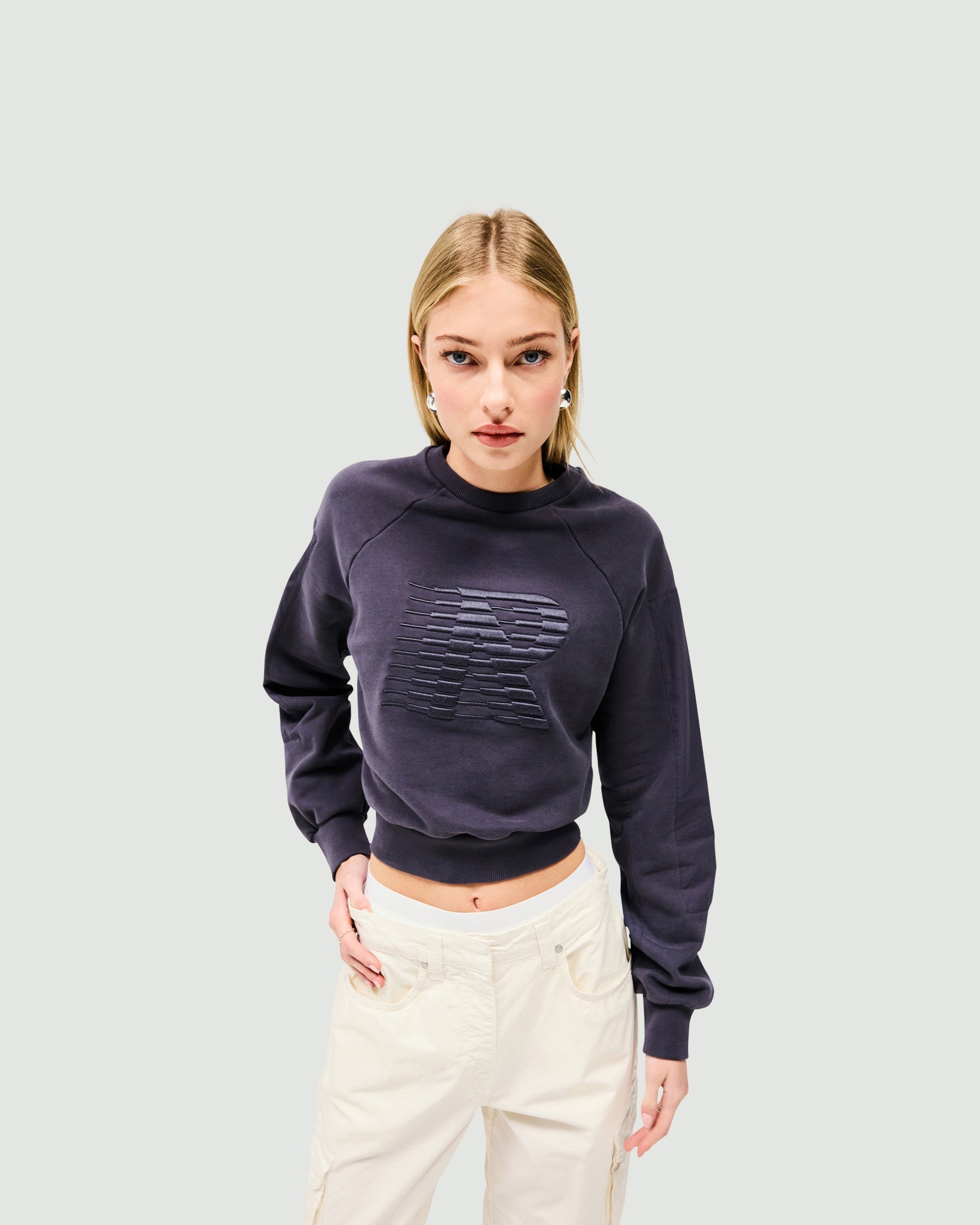 Back product image of a womens grey long sleeve top on a plain white background | Reverse Long Sleeve Top in Washed Grey | Long sleeve top with racing Initial R logo | Womens SS25 Tops | Represent Clo