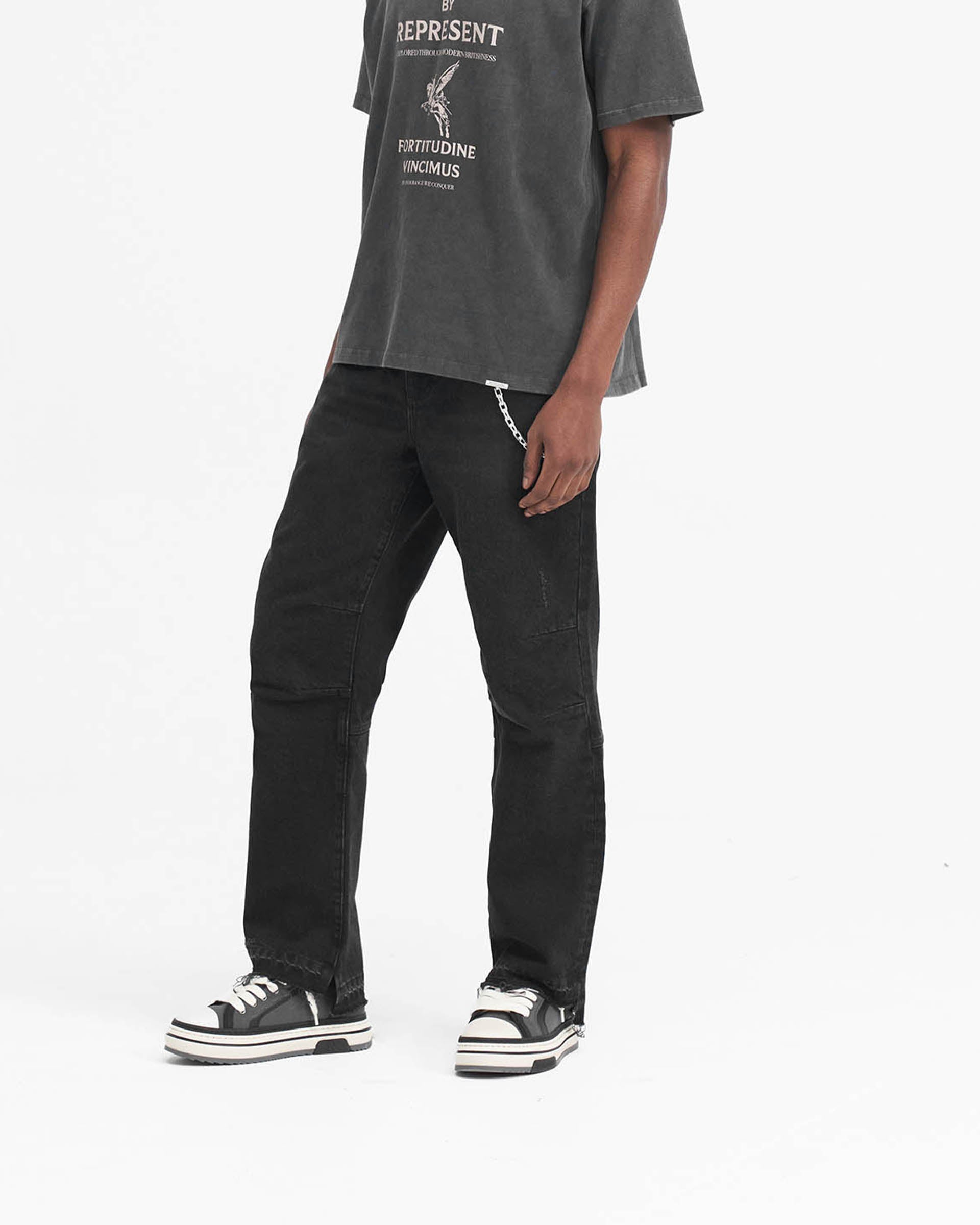 Back product image of mens black denim on a plain white background | R2 Stepped Hem Denim in Off Black | Jeans with stepped hem and whiskering details | SS24 Denim | Represent Clo
