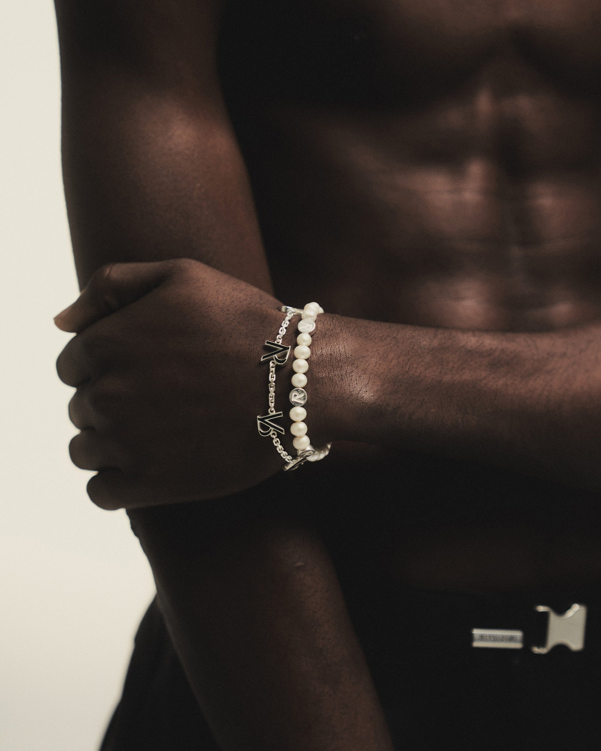 Back product image of a mens silver enamel bracelet on a plain white background | Represent Enamel Bracelet in Silver | Sterling silver bracelet with enamel initial logos | FW23 Accessories | Represent Clo
