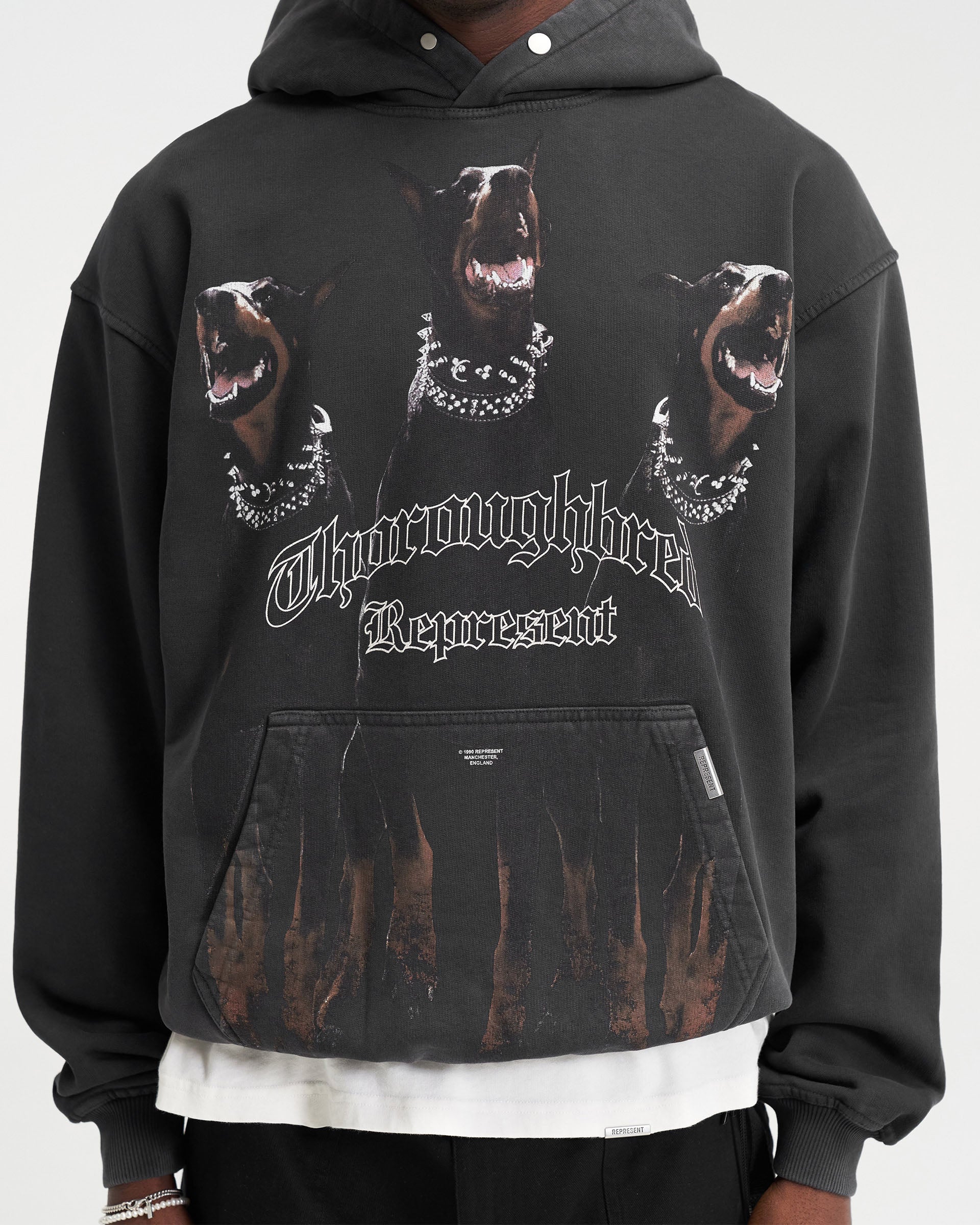 Back product image of a mens black hoodie on a plain white background | Thoroughbred Hoodie in Vintage Black | Heavy weight cotton hoodie with ribbed hem | FW21 Hoodies | Represent Clo