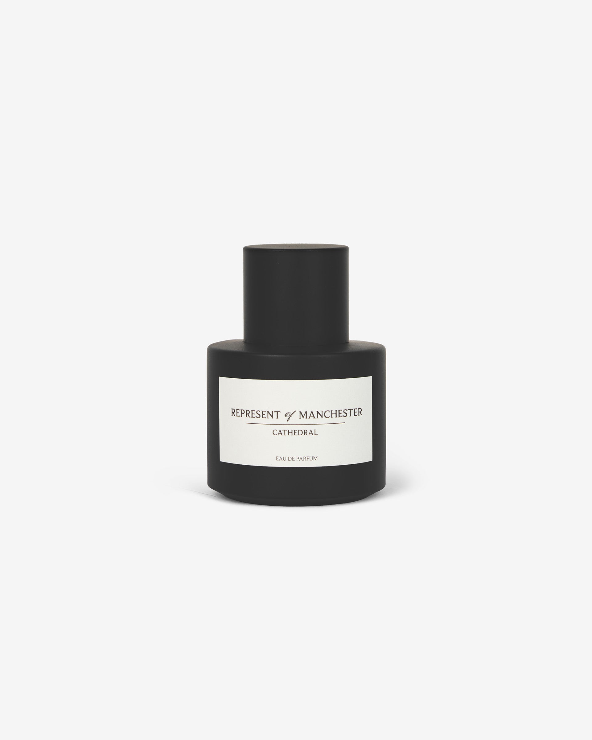 Front product image of a mens black fragrance bottle on a plain white background | Manchester Store Fragrance in Matte Black | Signature scent in matte finish | Exclusives Accessories | Represent Clo