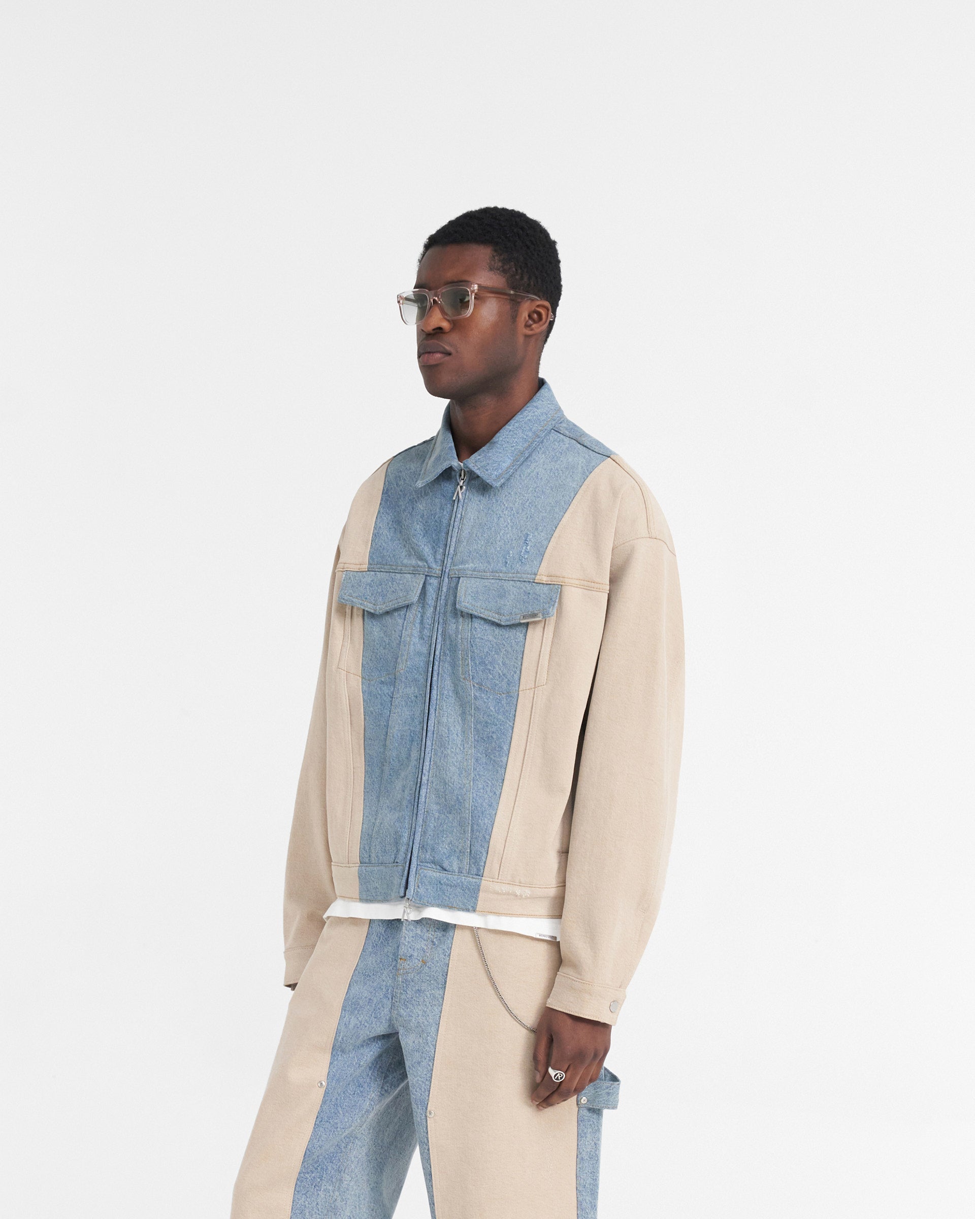 Back product image of a mens blue denim jacket on a plain white background | R4 Colour Block Denim Jacket in Blue | Boxy fit denim jacket with carpenter panelling | SS24 Denim | Represent Clo