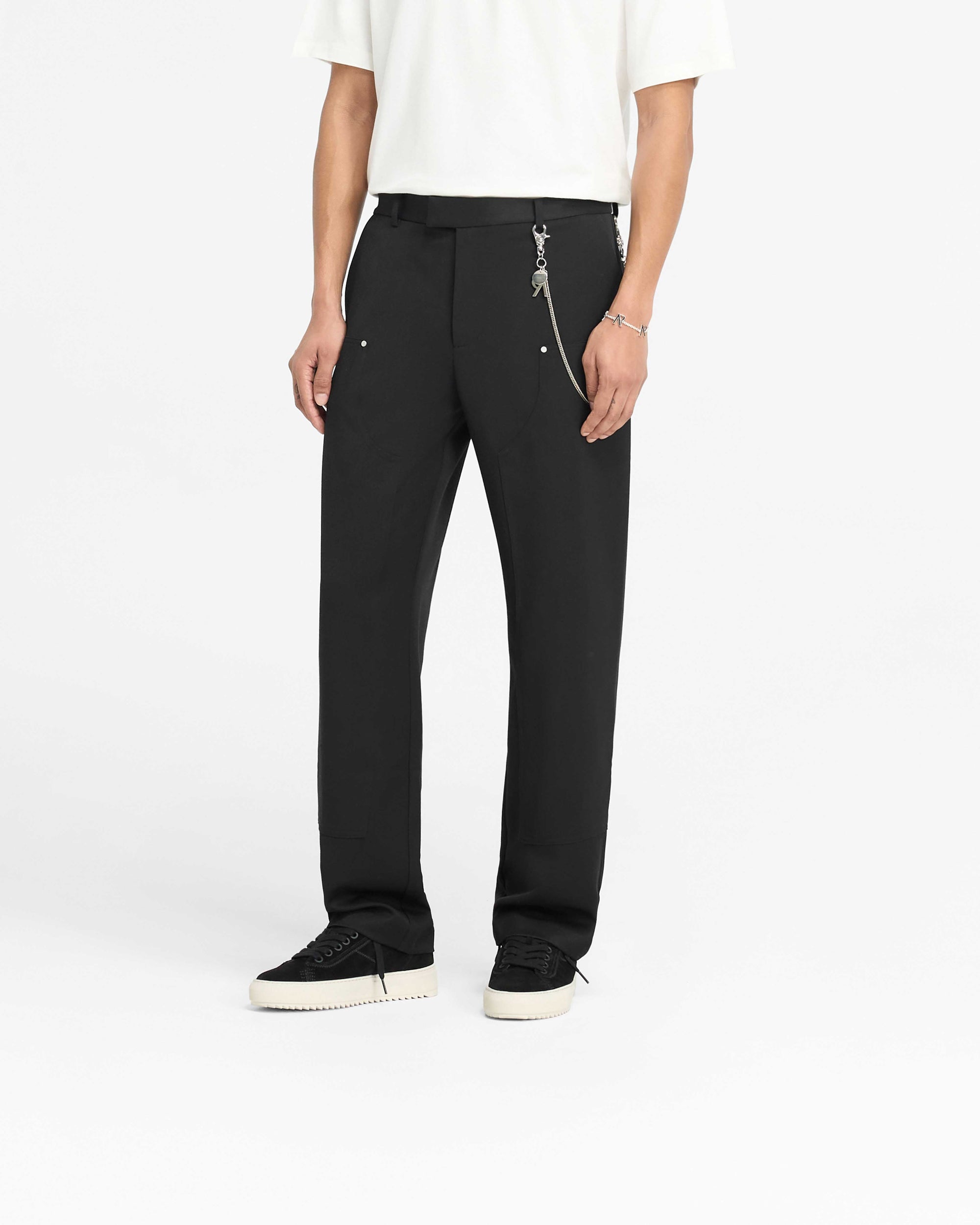 Back product image of mens black pants on a plain white background | Smart Utility Pant in Jet Black | Straight leg pants with fixed waistband and metal rivets | PRE SS25 Pants | Represent Clo