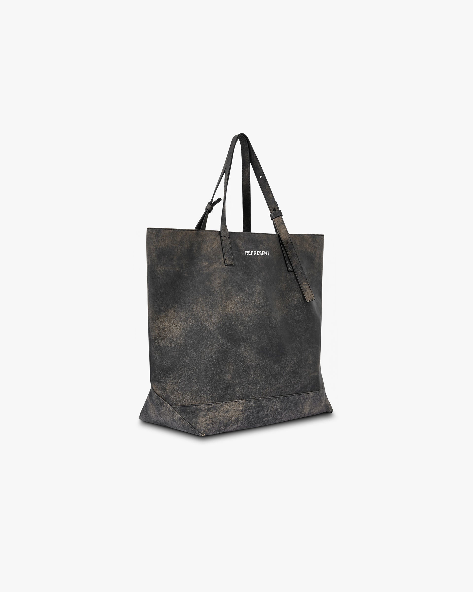 Back product image of a mens brown leather tote bag on a plain white background | Distressed Leather Tote Bag in Brown | Large tote bag with adjustable straps and inside pocket | FW24 Accessories | Represent Clo