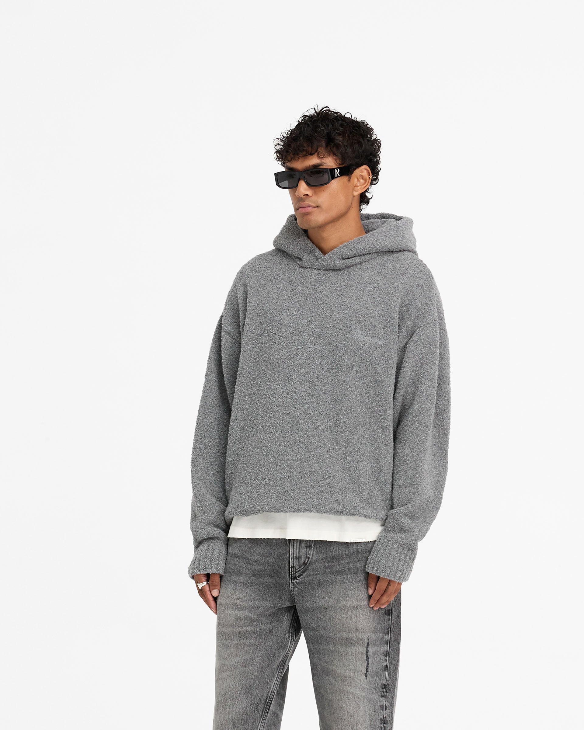 Back product image of a mens grey hoodie on a plain white background | Heavy Boucle Hoodie in Rock | Double lined oversized boxy knitwear | FW24 Knitwear | Represent Clo
