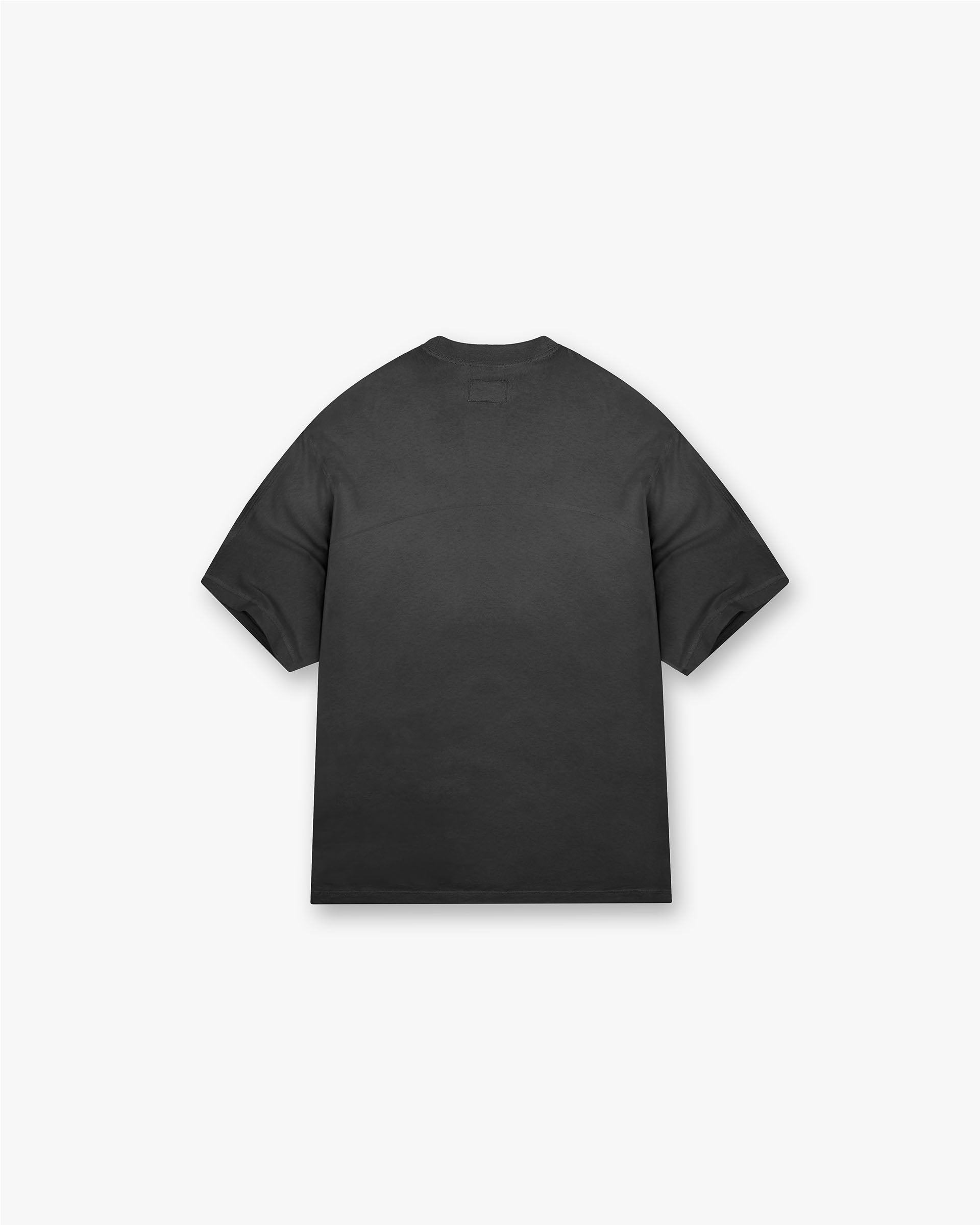 Back product image of a mens black t-shirt on a plain white background | Stepped Hem T-Shirt in Stained Black | Oversized t-shirt with stepped hem | FW24 T-Shirts | Represent Clo