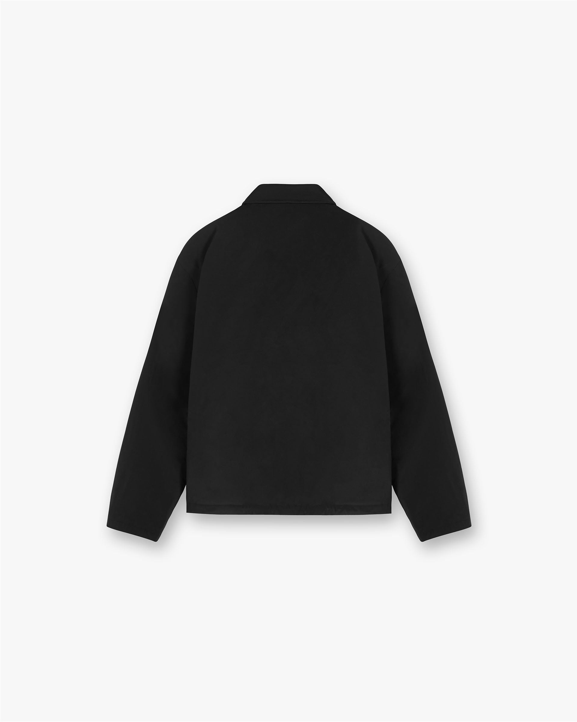 Back product image of a mens black jacket on a plain white background | Represent Owners Club Coach Jacket in Black | Lightweight jacket with ruching and welt pockets | Owners Club Outerwear | Represent Clo