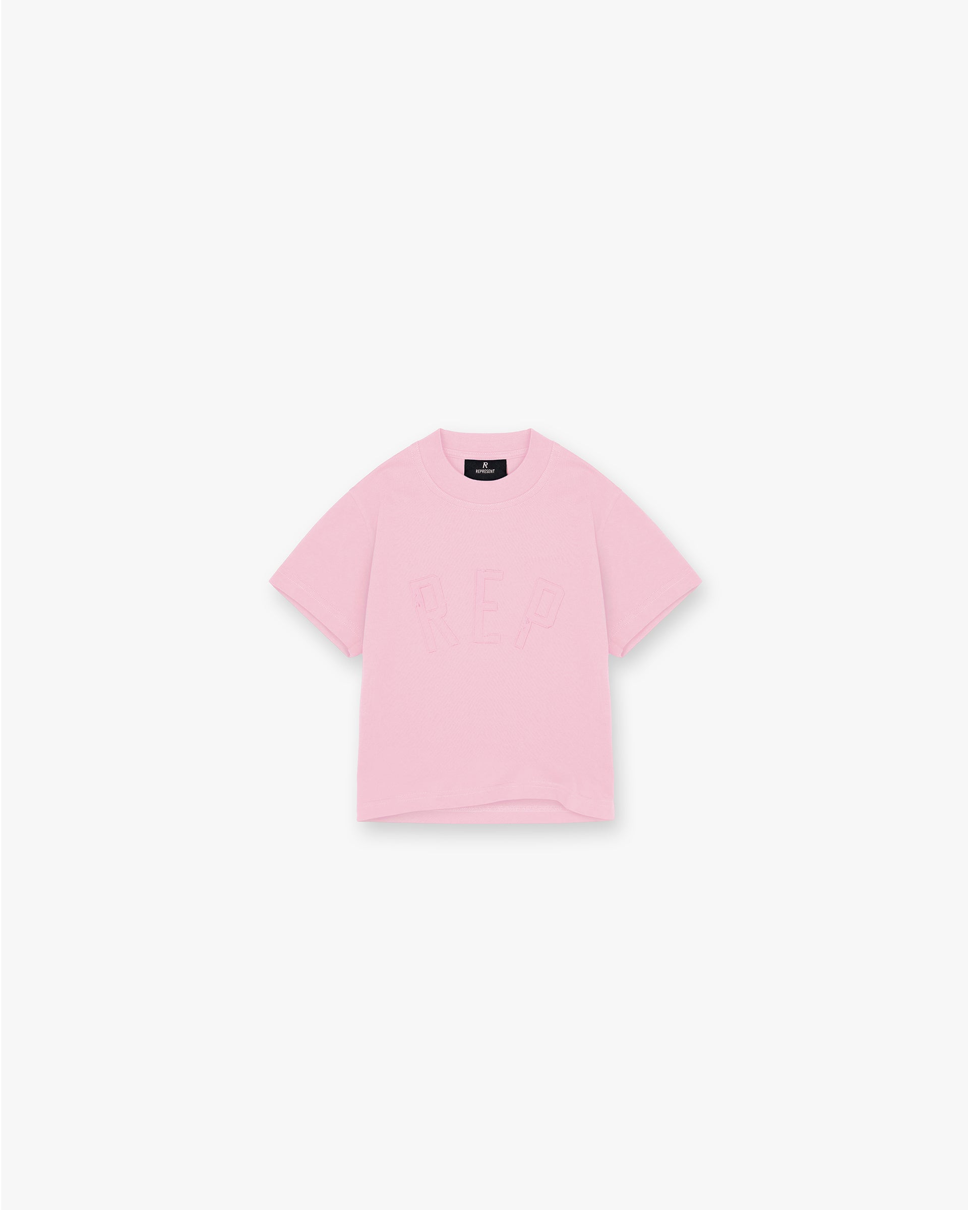 Front product image of a childs pink t-shirt on a plain white background | Mini Rep Applique T-Shirt in Candy Pink | Oversized childs t-shirt with applique logo | FW24 T-Shirts | Represent Clo