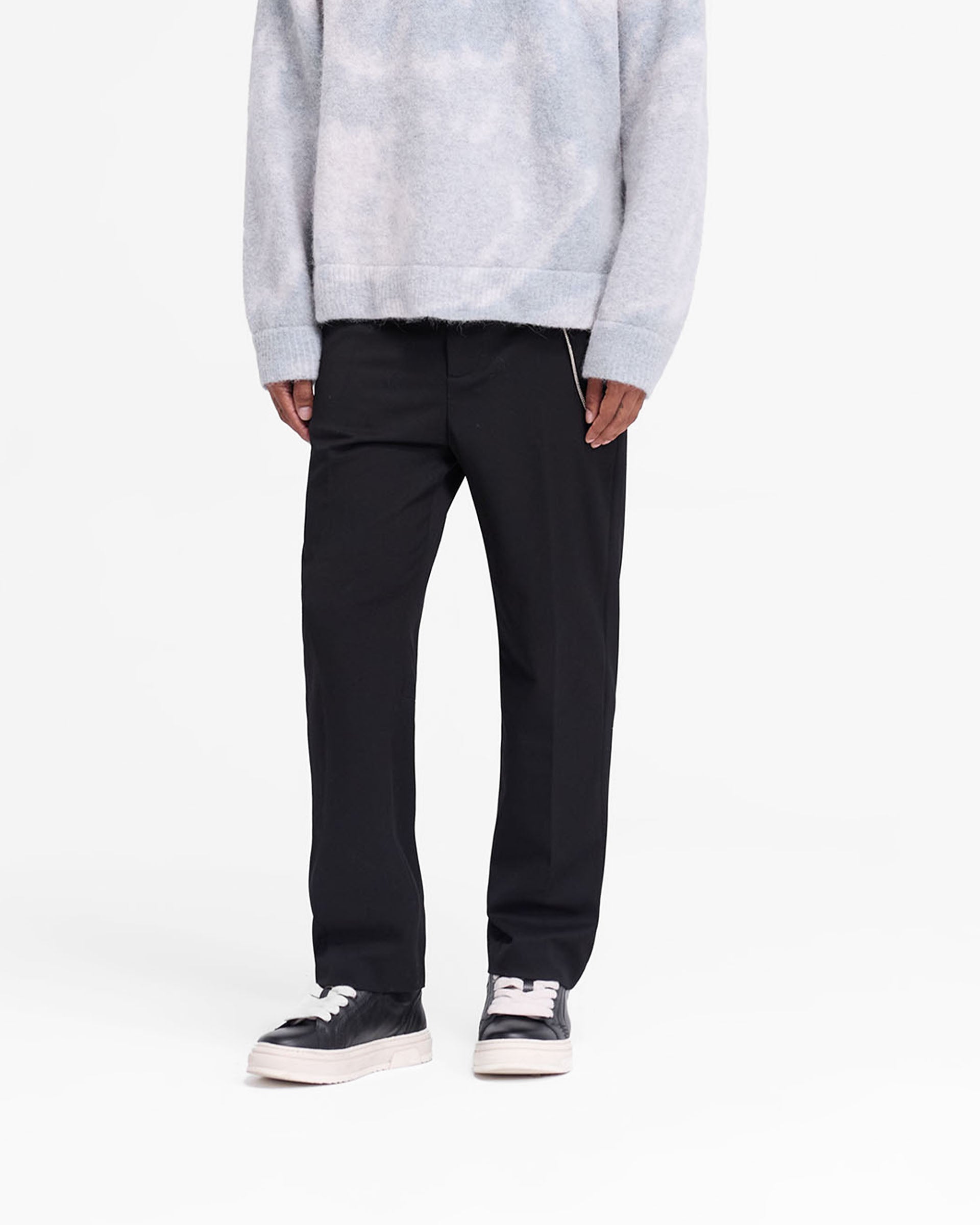 Back product image of mens black pants on a plain white background | Smoking Pant in Black | Slim silhouette cropped pants with fixed waistband | FW24 Pants | Represent Clo