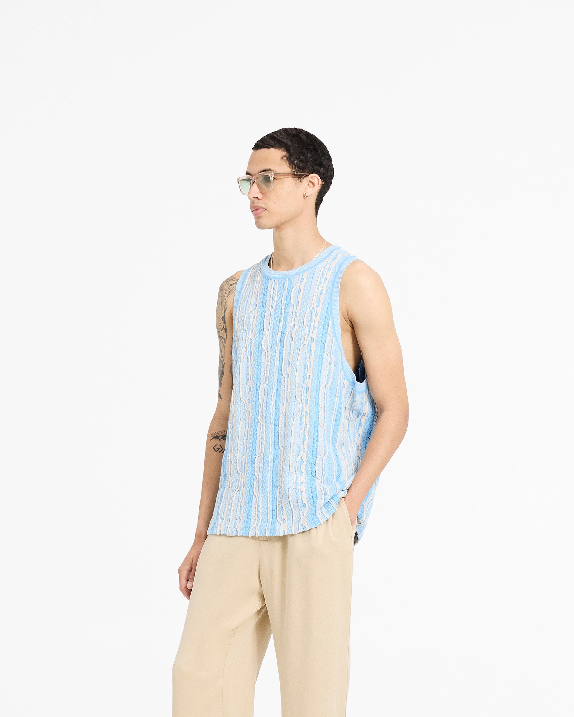 Back product image of a mens blue knit vest on a plain white background | Mixed Knit Vest in Royal Blue | Regular fit vest with custom knit pattern and round neck | SC24 Knitwear | Represent Clo