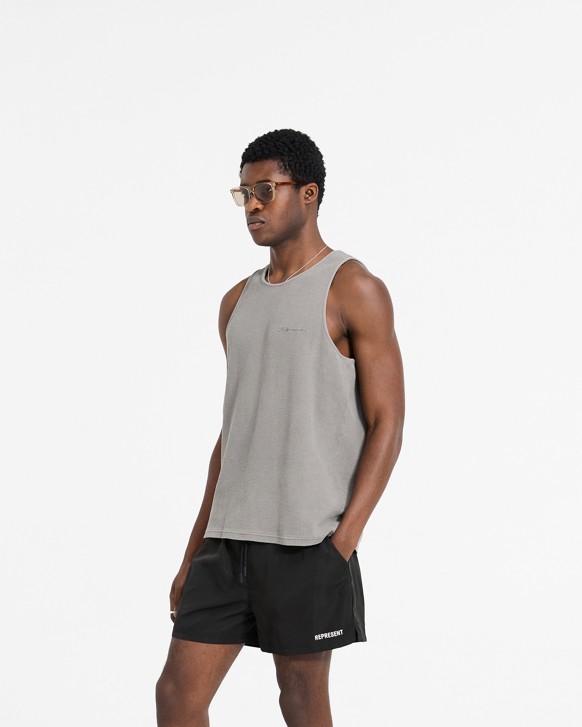 Back product image of a mens grey vest on a plain white background | Waffle Vest in Ultimate Grey | Regular fit vest with mineral wash | SC24 T-Shirts | Represent Clo