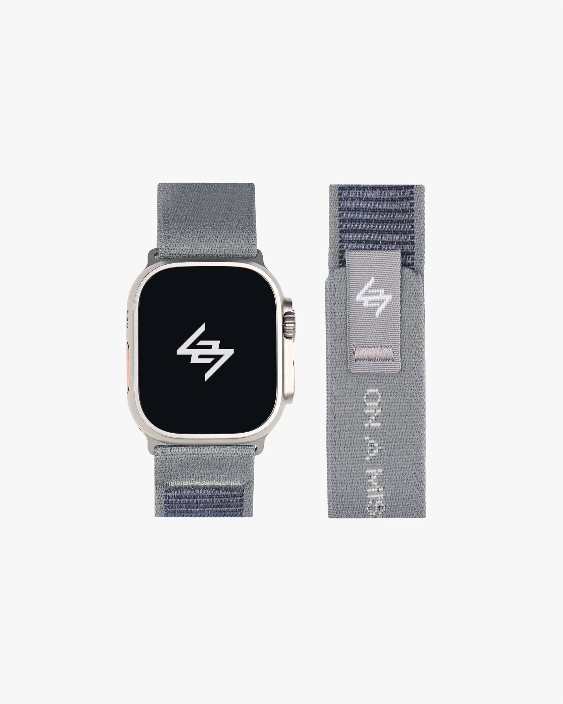Back product image of a mens grey watch strap on a plain white background | 247 Apple Watch Strap in Titanium | Nylon weave watch strap with velcro fastener | 247 Accessories | Represent Clo