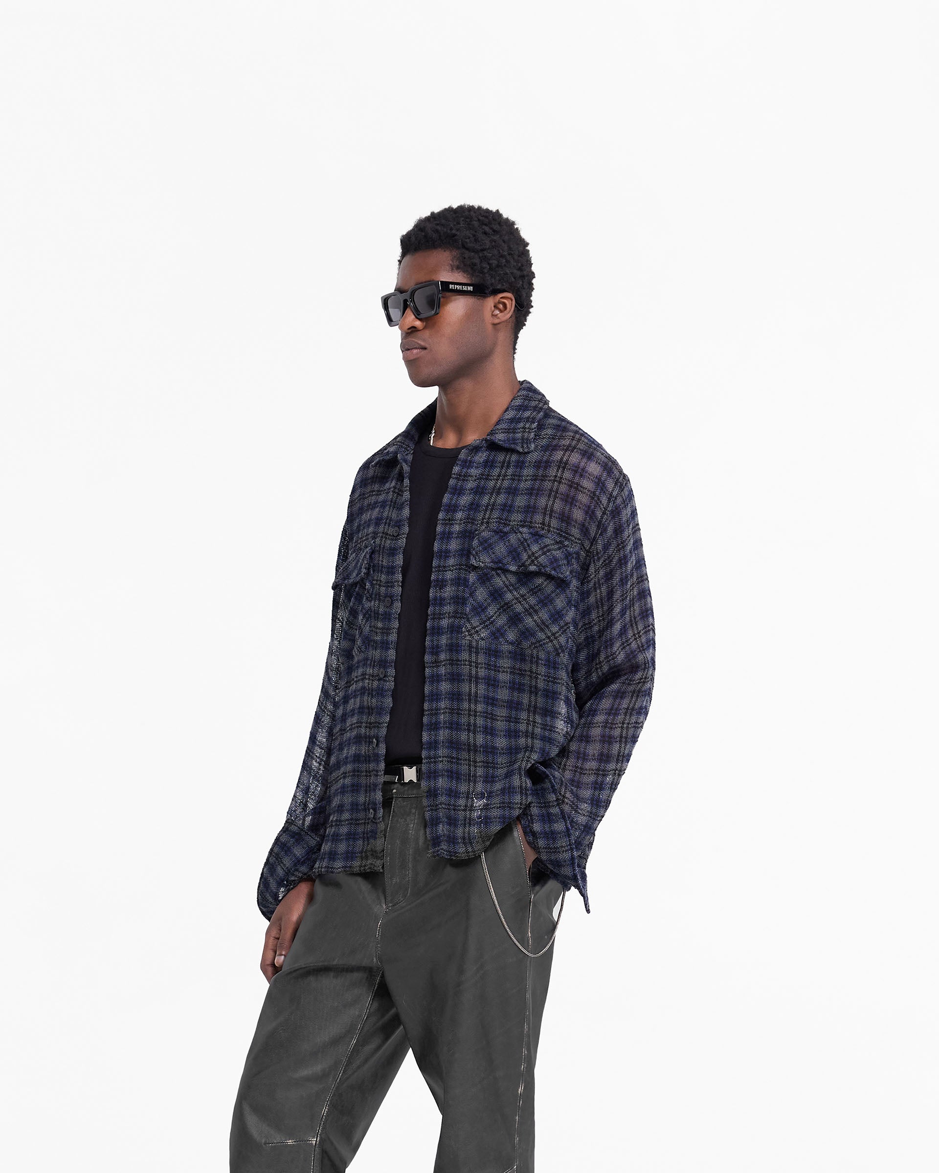 Back product image of a mens blue check shirt on a plain white background | Check Flannel Shirt in Blue Check | Flannel shirt with flap pockets and button-up front | FW24 Shirts | Represent Clo
