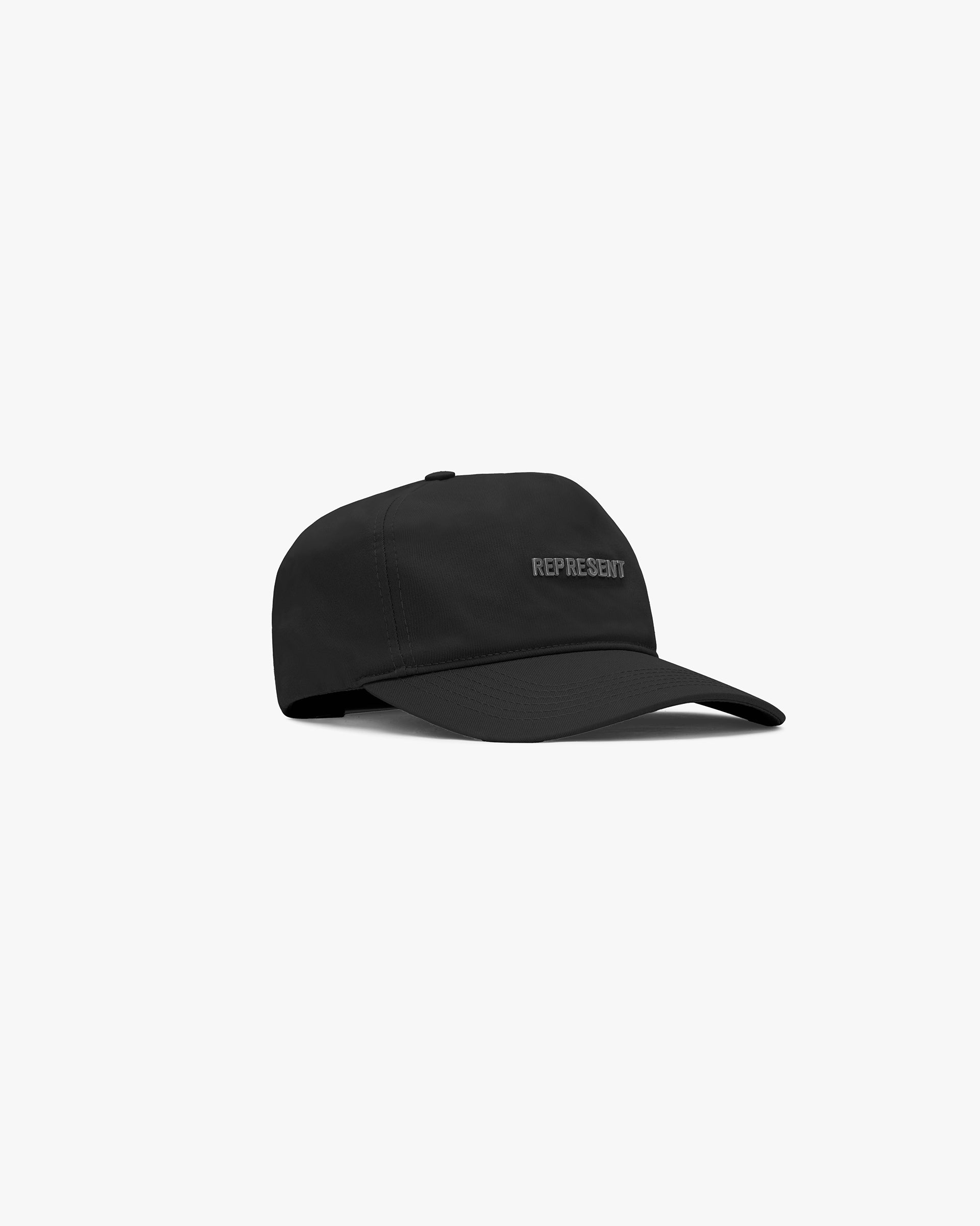Front product image of a black cap on a plain white background | Represent Cap in Black | Cap with adjustable strap and soft visor | SS24 Accessories | Represent Clo