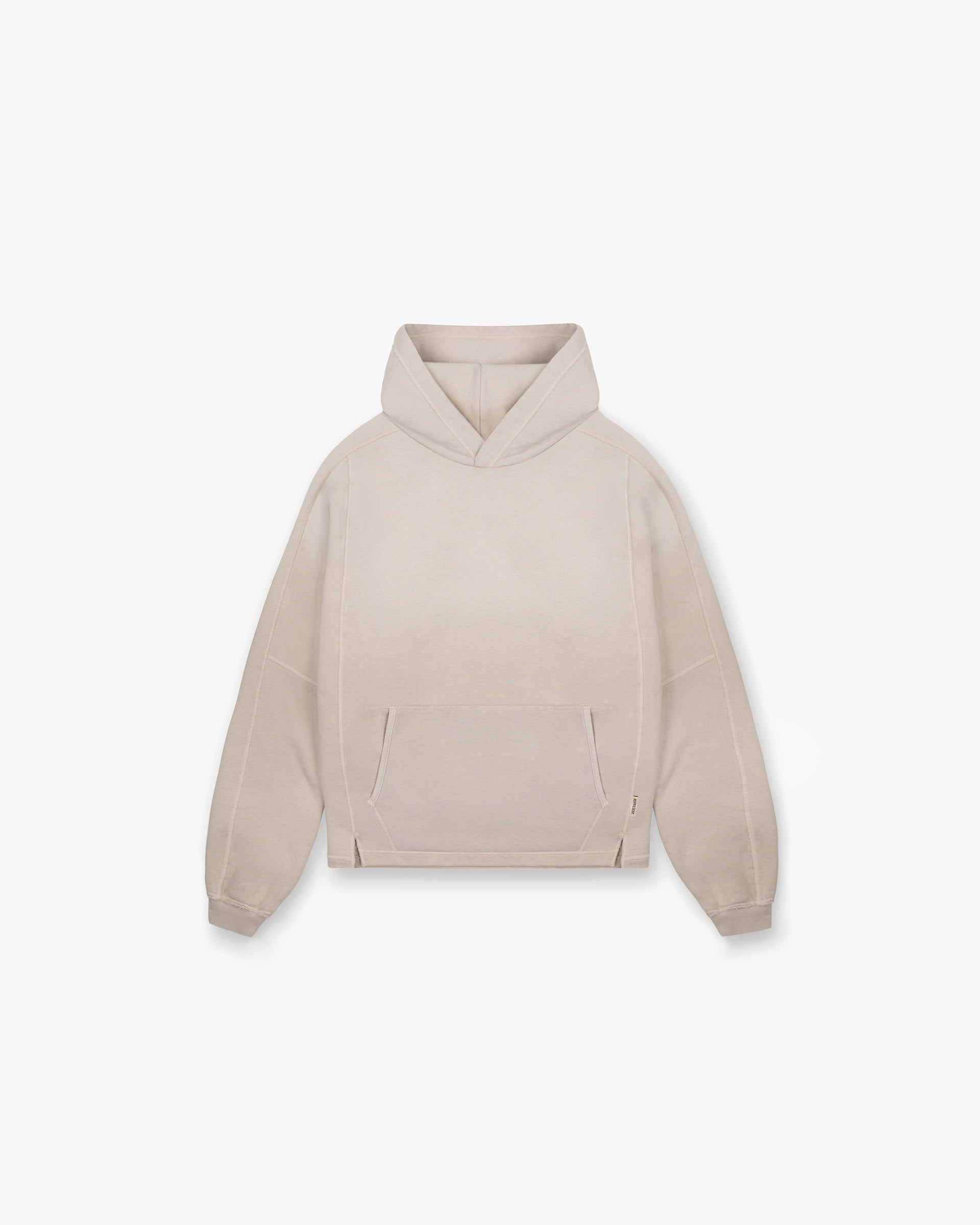 Front product image of a mens oat hoodie on a plain white background | Stepped Hem Hoodie in Oat | Heavyweight slightly oversized hoodie | FW24 Hoodies | Represent Clo
