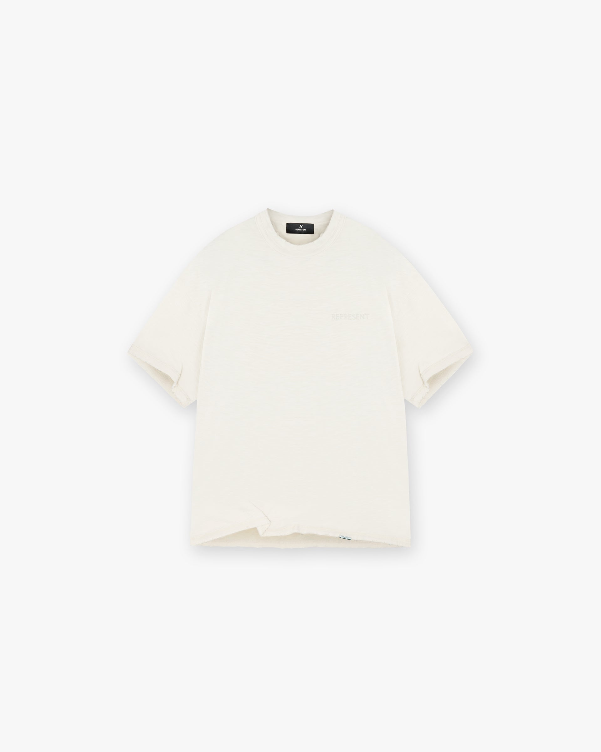 Front product image of a mens white t-shirt on a plain white background | Slub T-Shirt in Flat White | T-shirt with mainline oversized fit and cracked print | FW24 T-Shirts | Represent Clo