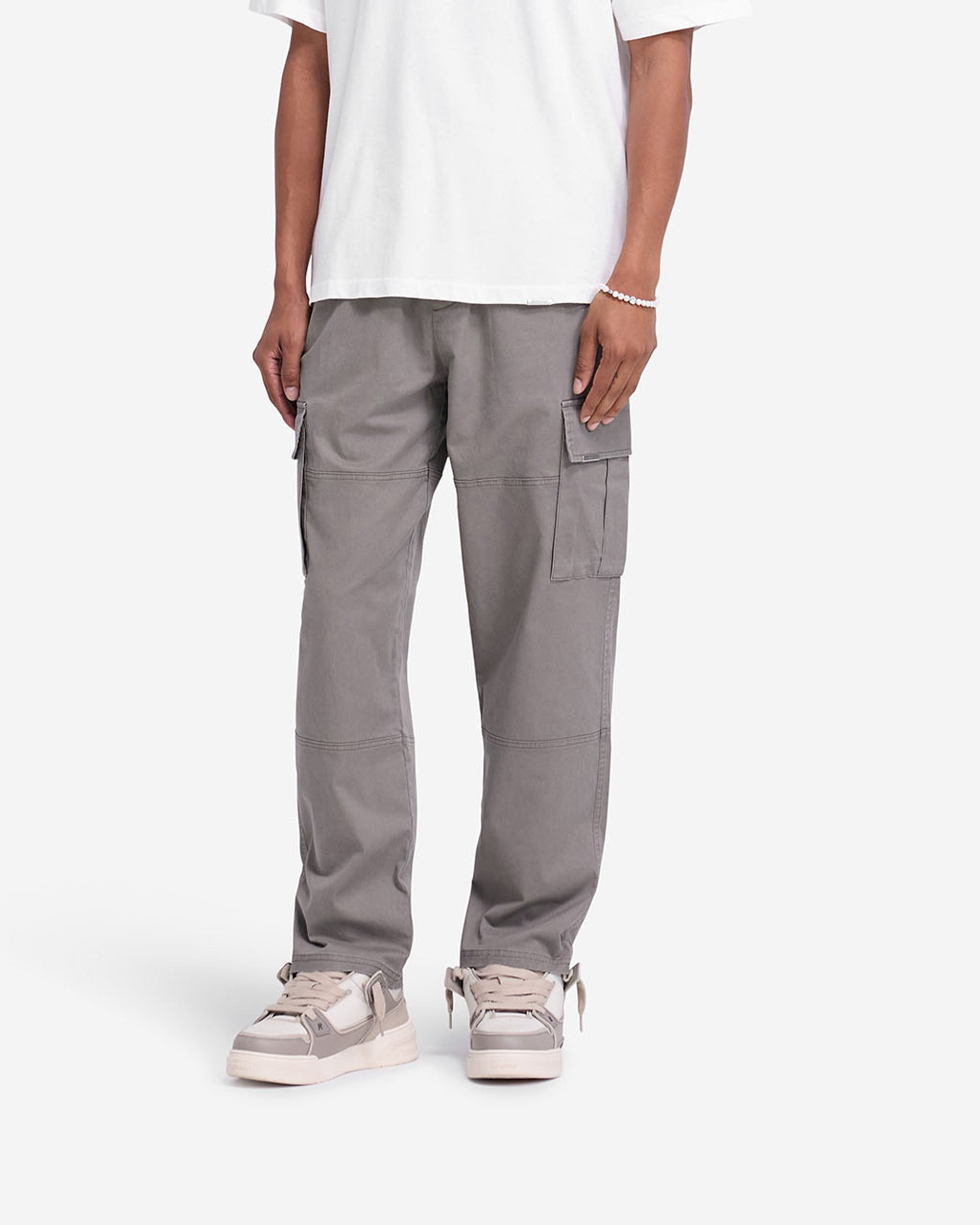Back product image of mens dark taupe cargo pants on a plain white background | Cargo Pant in Dark Taupe | Cargo pants with elasticated waistband and flap pockets | FW24 Pants | Represent Clo