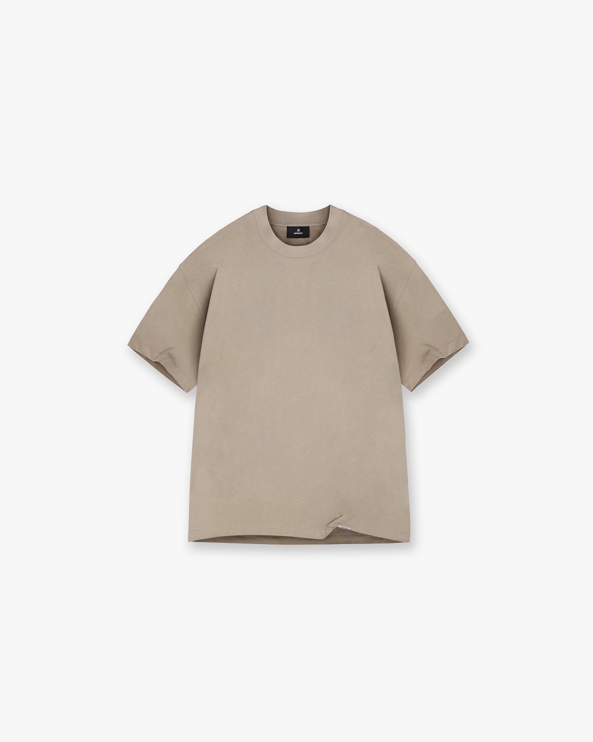 Front product image of a mens beige t-shirt on a plain white background | Initial Oversized T-Shirt in Dune | Oversized fit t-shirt | Initial T-Shirts | Represent Clo