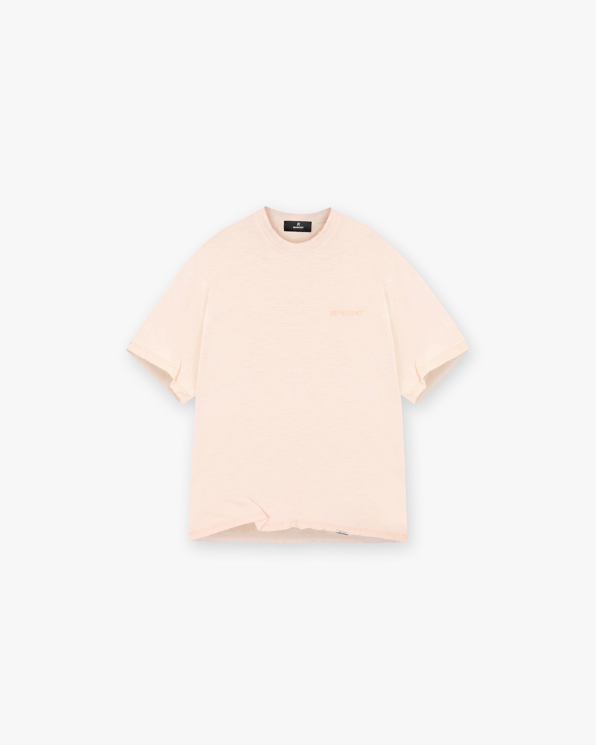 Front product image of a mens coral t-shirt on a plain white background | Slub T-Shirt in Washed Coral | Oversized t-shirt with cracked graphics and distressed details | FW24 T-Shirts | Represent Clo