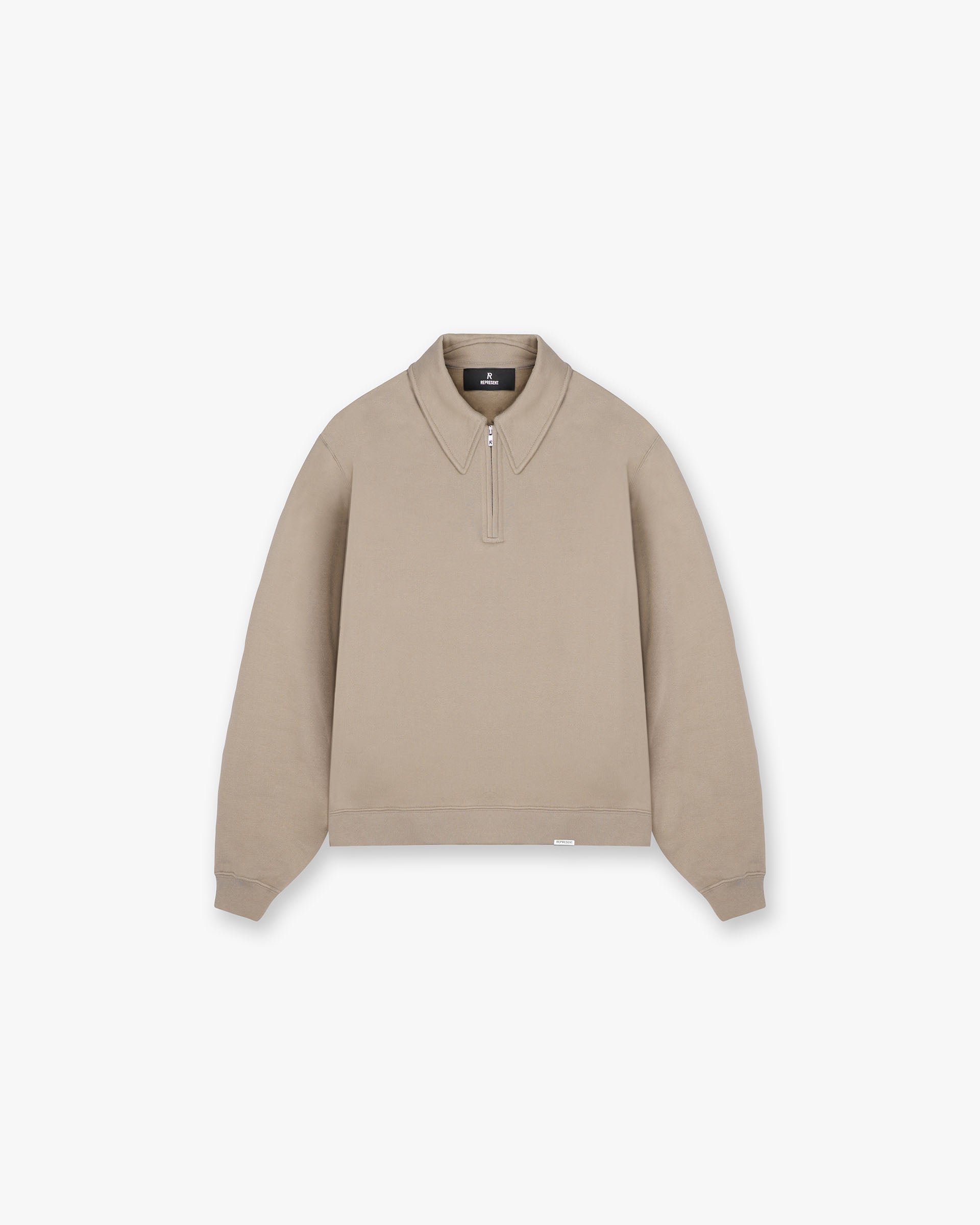 Front product image of a mens beige sweater on a plain white background | Initial Boxy Quarter Zip in Dune | Sweater with quarter zip design | Initial Sweaters | Represent Clo