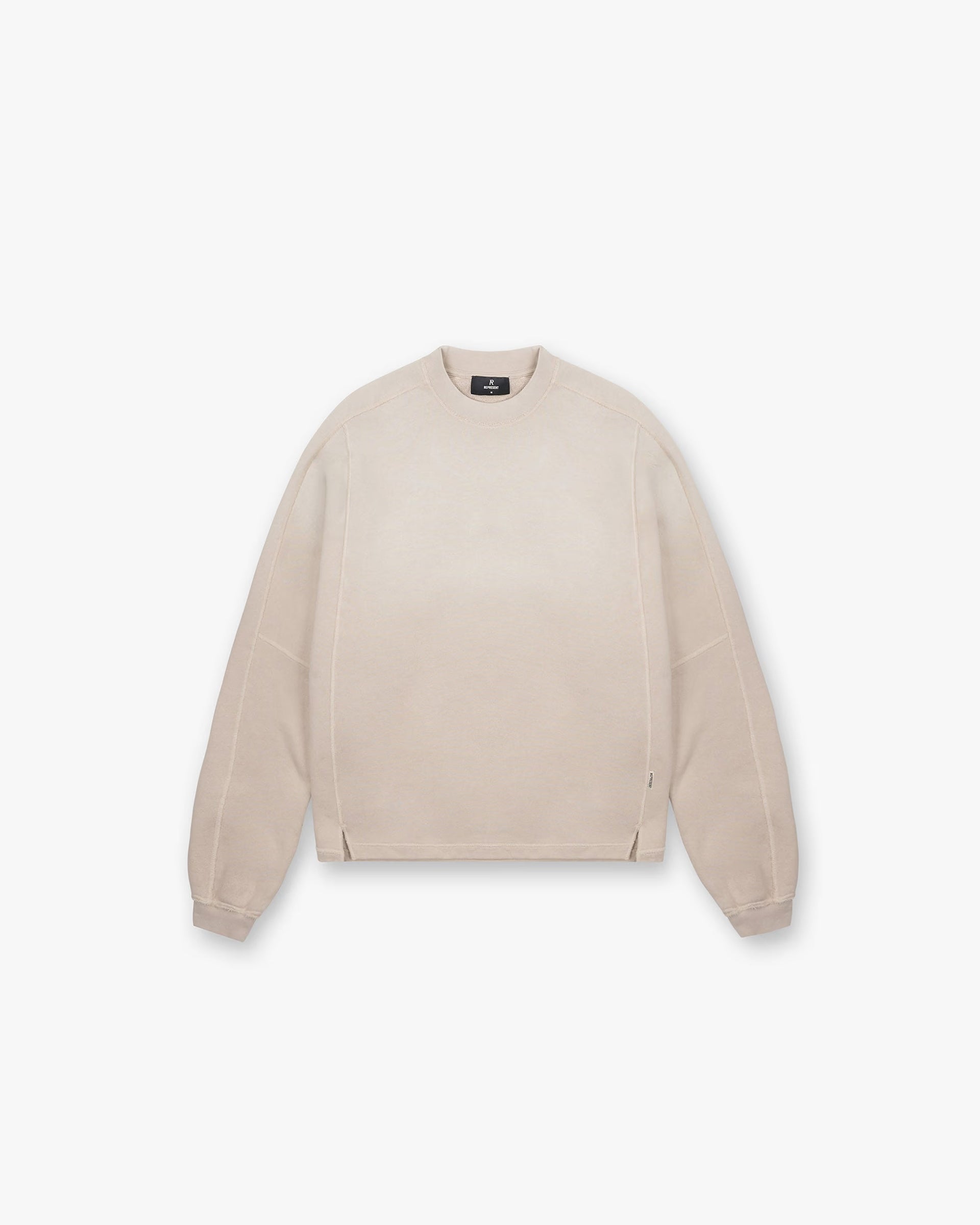 Front product image of a mens oat sweatshirt on a plain white background | Stepped Hem Sweatshirt in Oat | Sweaters with stepped hem design | FW24 Sweaters | Represent Clo