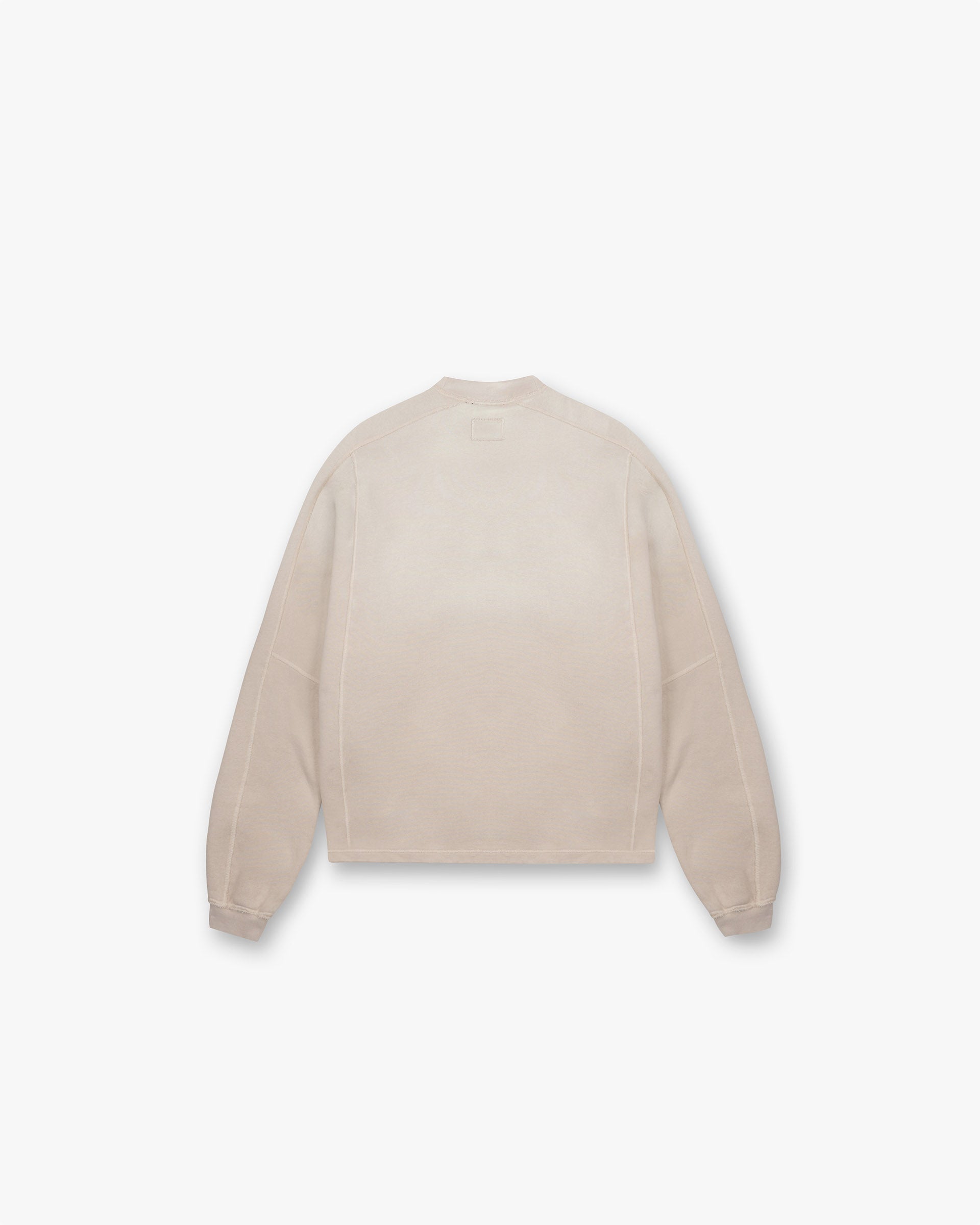 Back product image of a mens oat sweater on a plain white background | Stepped Hem Sweatshirt in Oat | Oversized sweater with stepped hem and overlock seams | FW24 Sweaters | Represent Clo