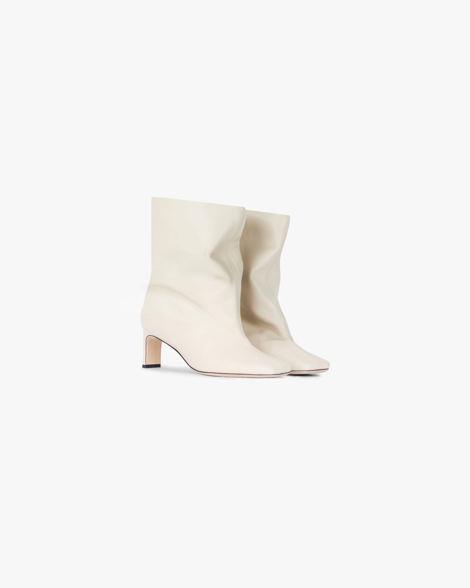Back product image of a womens ecru ankle boot on a plain white background | Square Toe Ankle Boot in Ecru | Ankle boots with lambskin nappa leather and slouchy look | Womens SS25 Footwear | Represent Clo