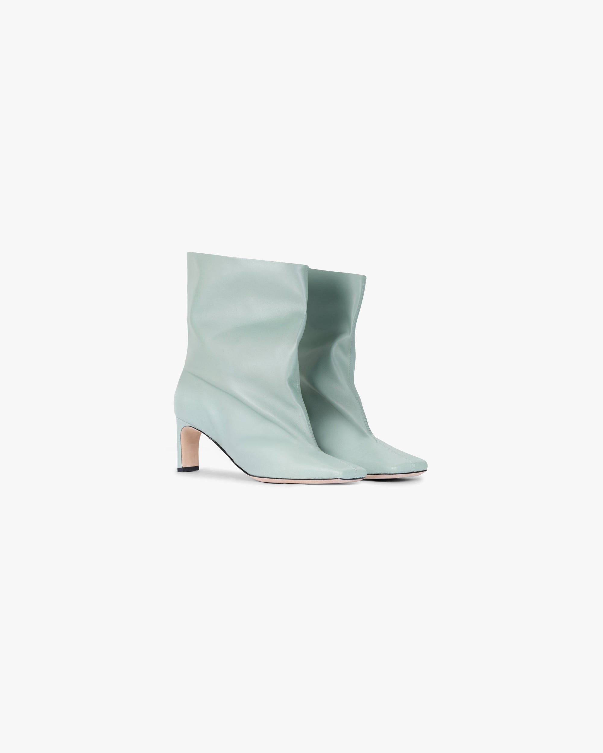 Back product image of a womens green ankle boot on a plain white background | Square Toe Ankle Boot in Basil | Mid calf height with square toe | SS25 Footwear | Represent Clo